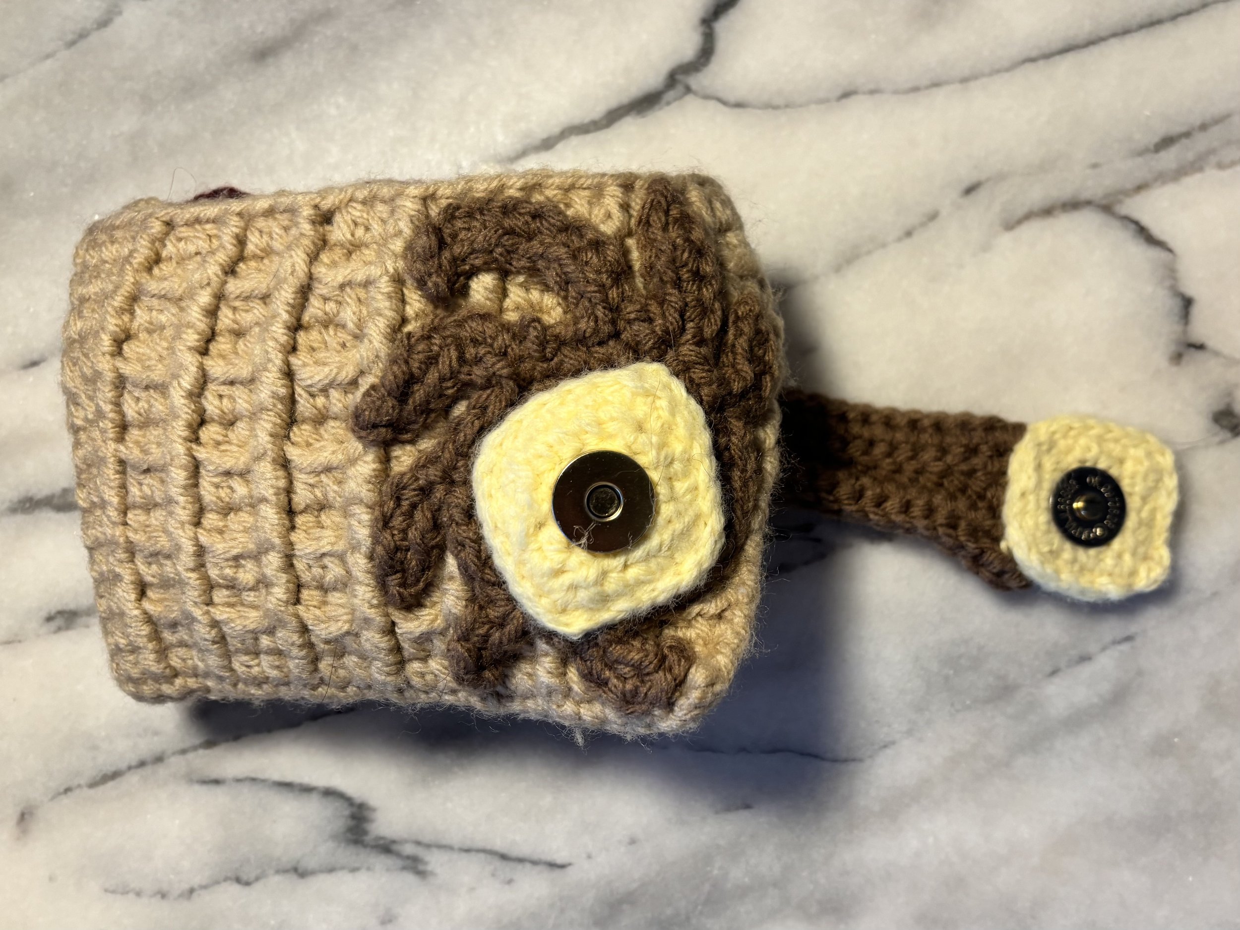 Waffle Wallet, 2024, original pattern crocheted in acrylic.