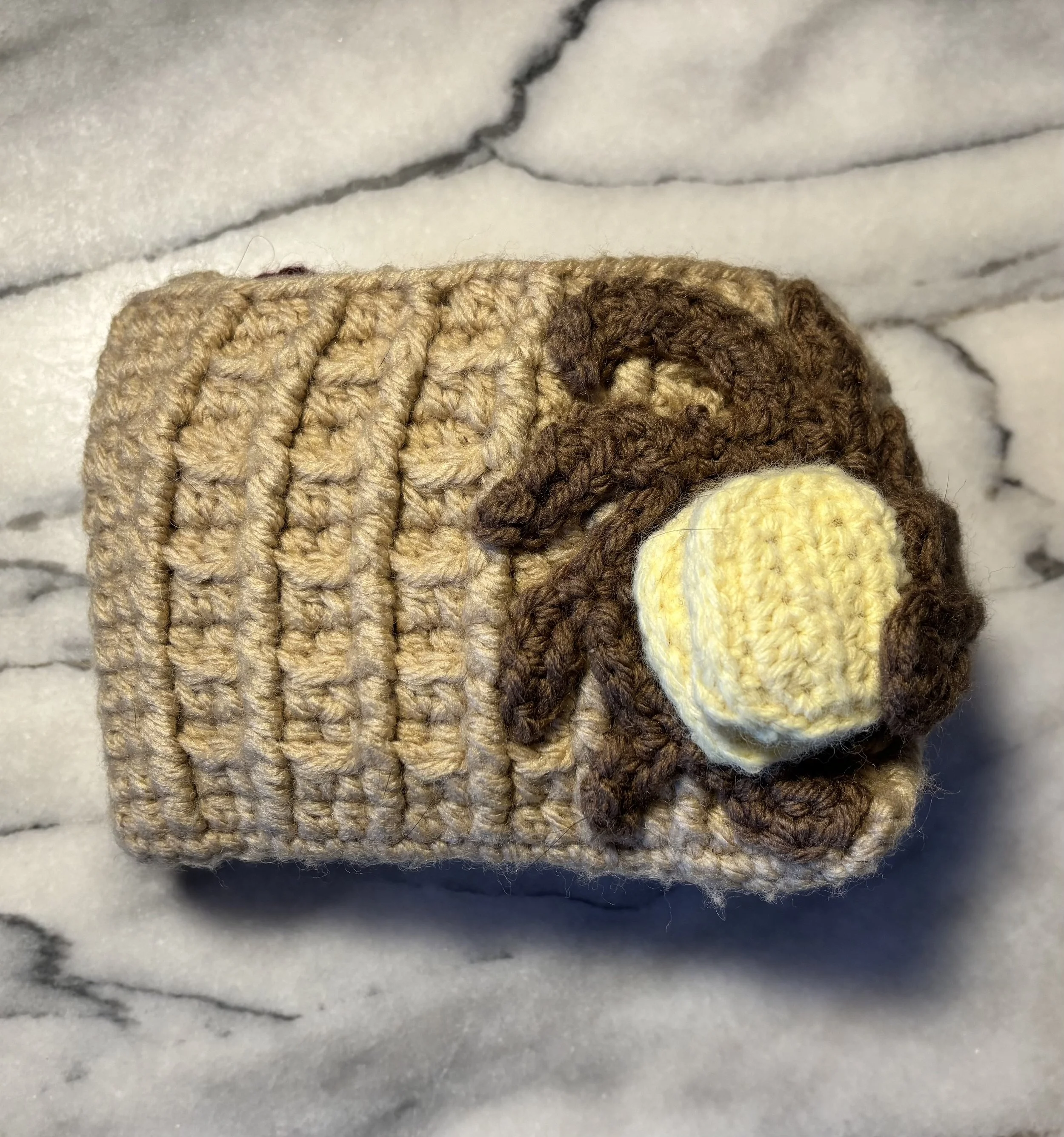 Waffle Wallet, 2024, original pattern crocheted in acrylic.
