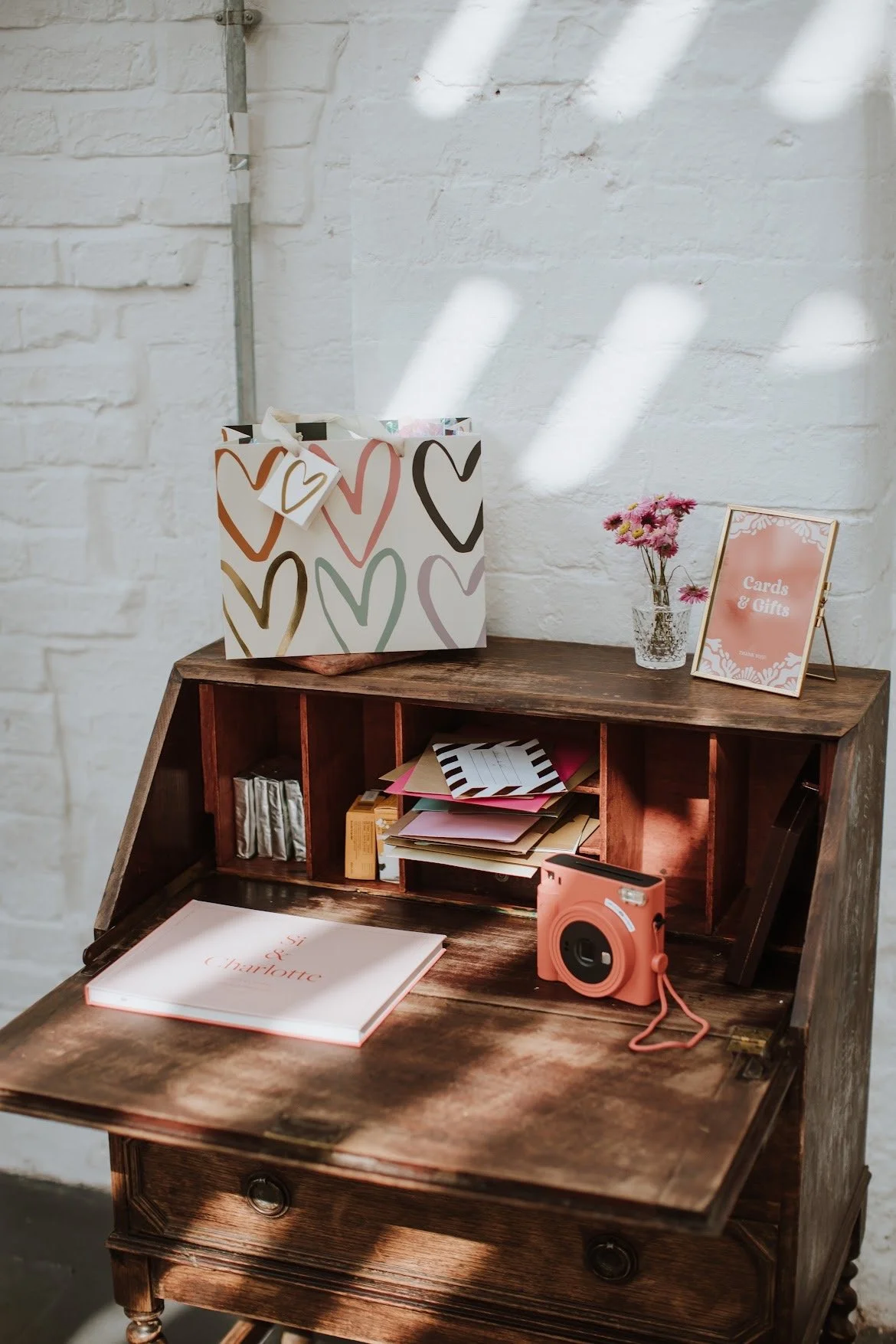 Styled Photo Station on Vintage Bureau to hire for weddings