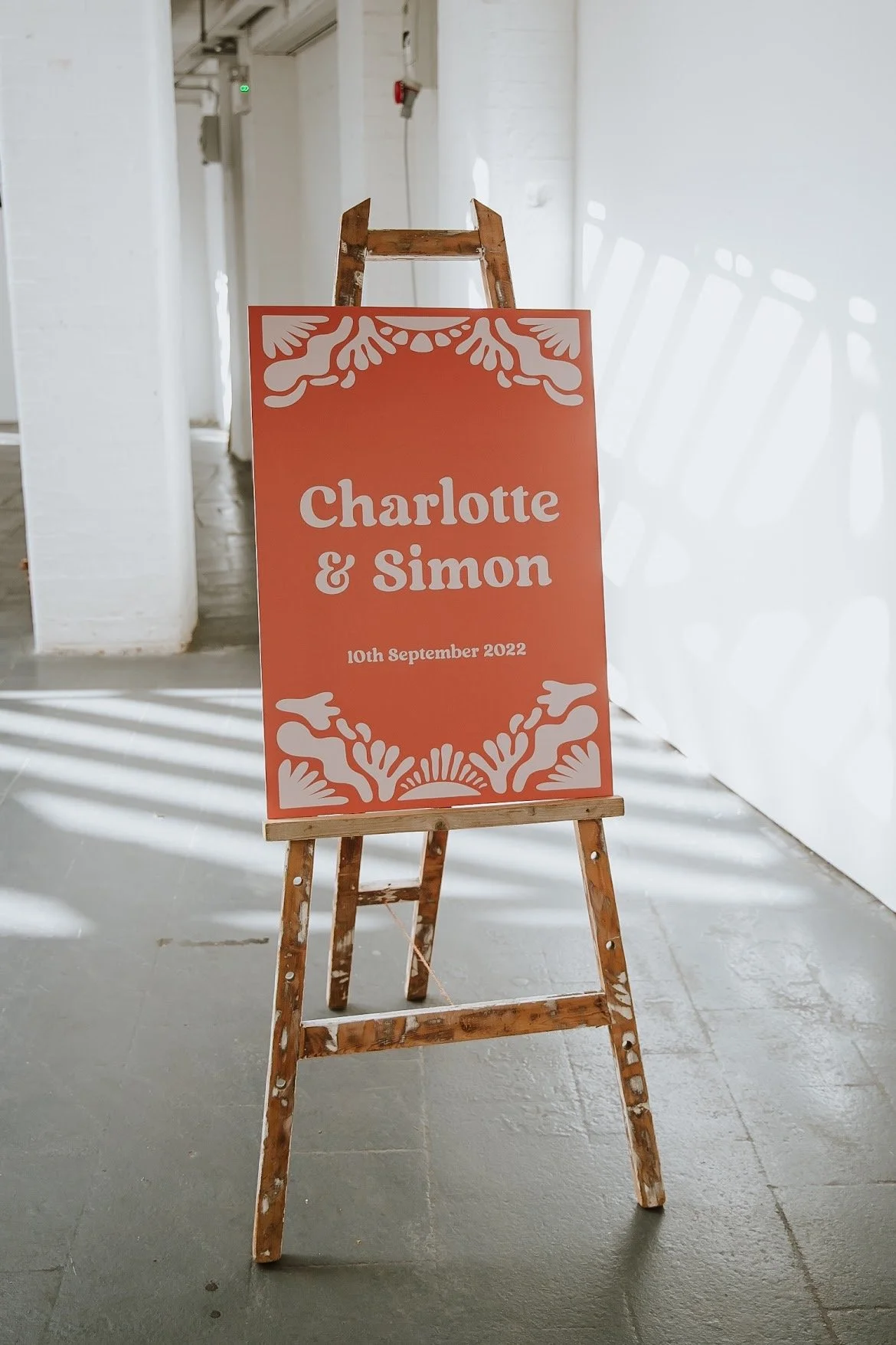 Pink Welcome Sign at Industrial warehouse weddings