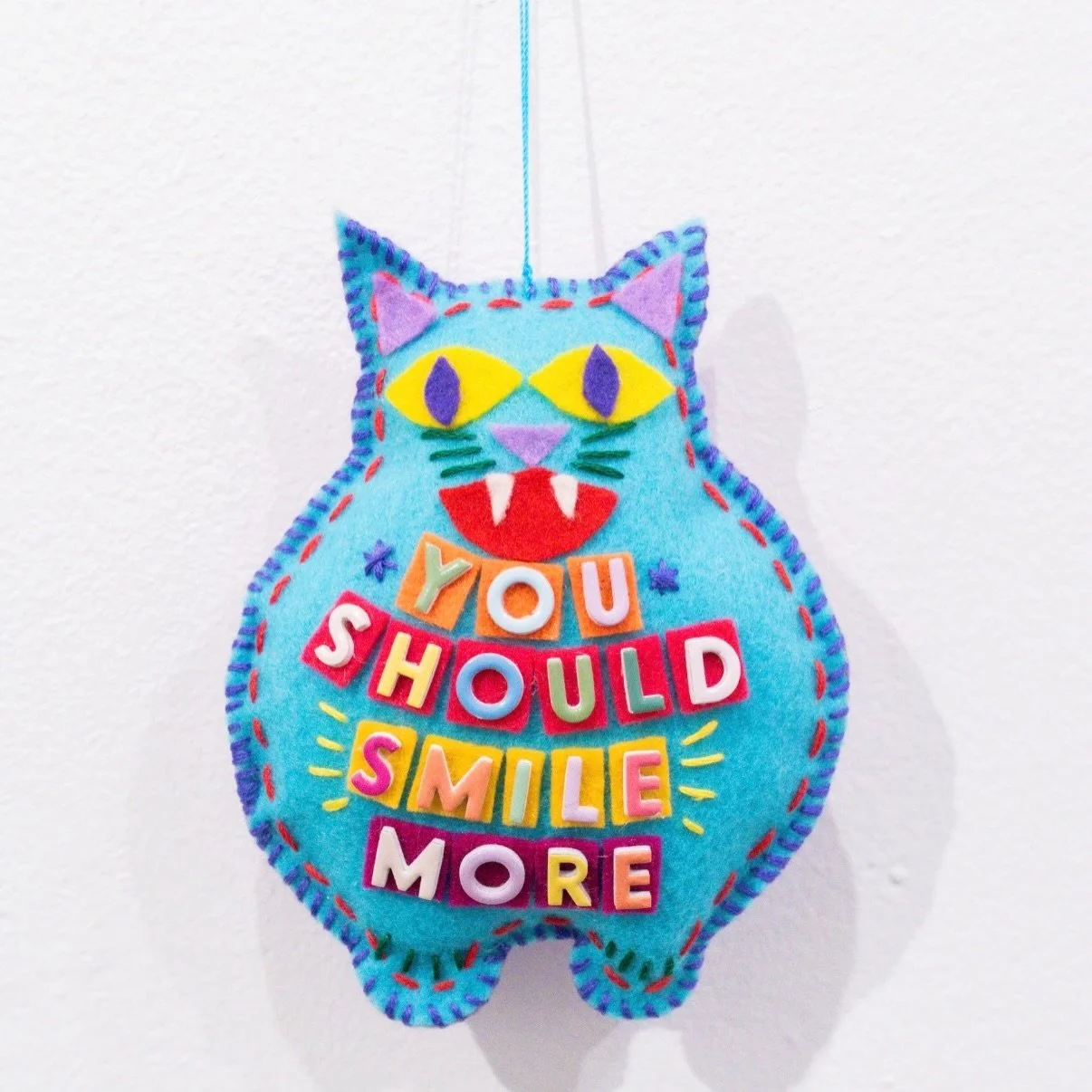 grab your very own feminist felt furry, handcrafted by Carol H. Dewall for only $46! 
&bull;
&ldquo;Words, Keeping Us In Stitches&rdquo;
Felt &amp; Thread Objects 2025/2026
Carol H. Dewall
&bull;
#omahaartists #youshouldsmilemore #feltartist #origina