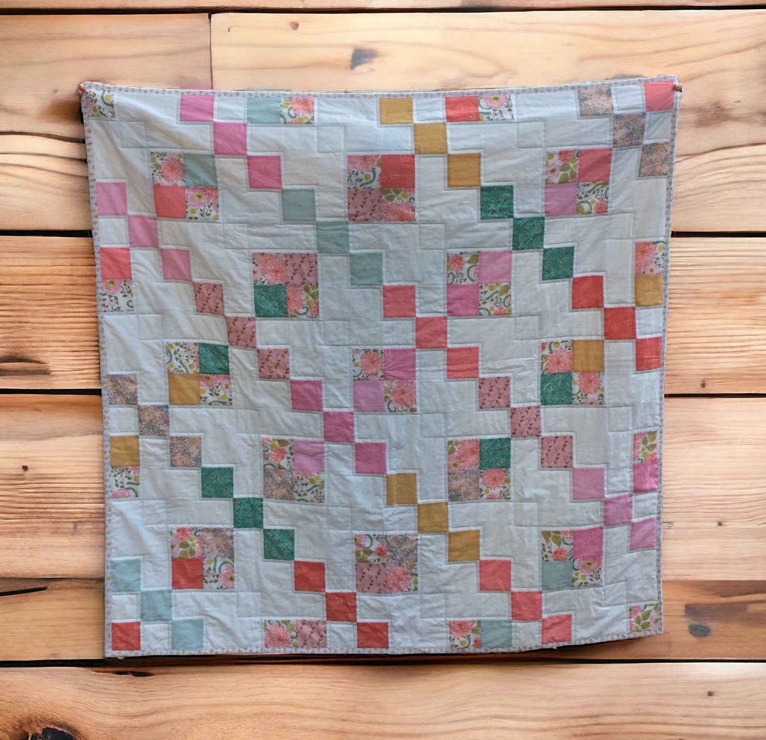 Quilt for Baby Eva in soft pinks and greens