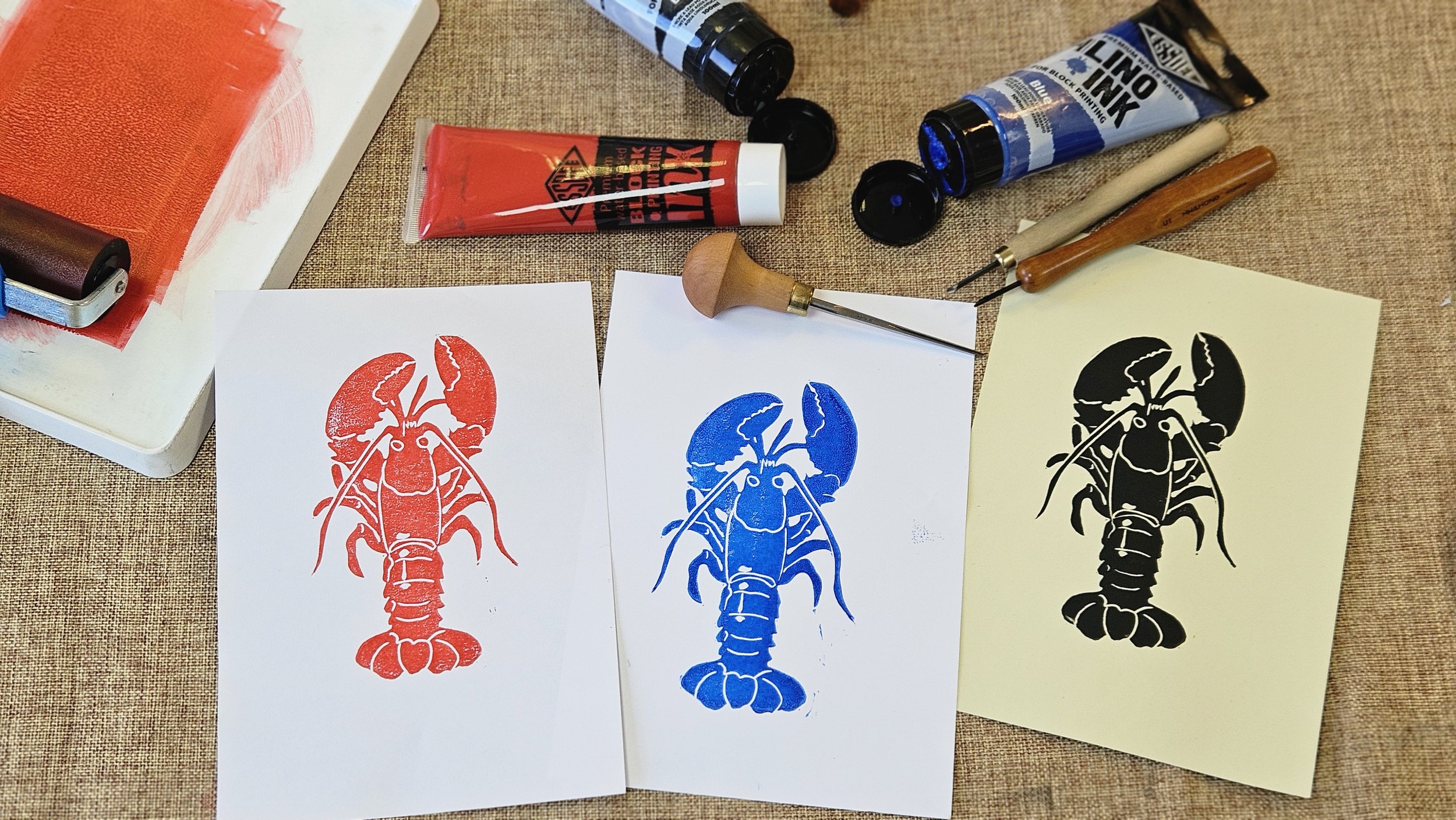 lobster print designs in red, blue and black.