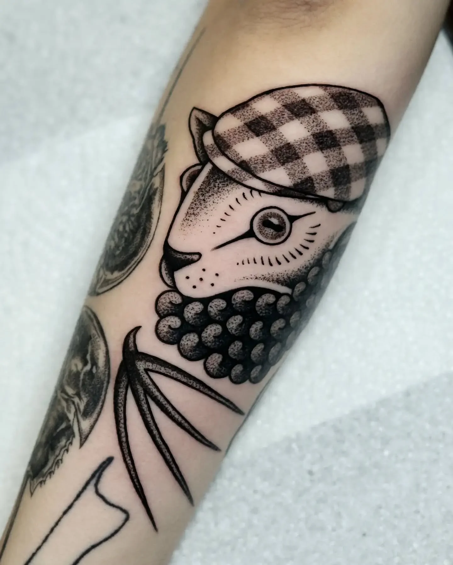 &bull; S H E E P &bull; 

Fun black and grey sheep head design, with a gap filler swallow, that I forgot to post at the start of the year. I remember it being a lot of fun tattoing the patterns into the hat. Would always be up for more like this.

I 