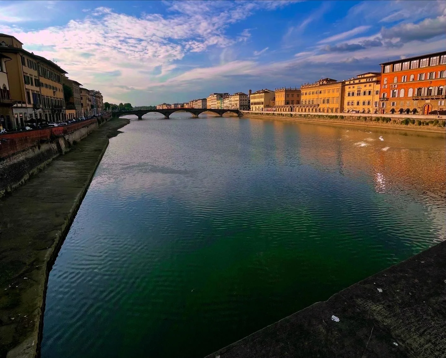 Florence, Italy people watching on the river