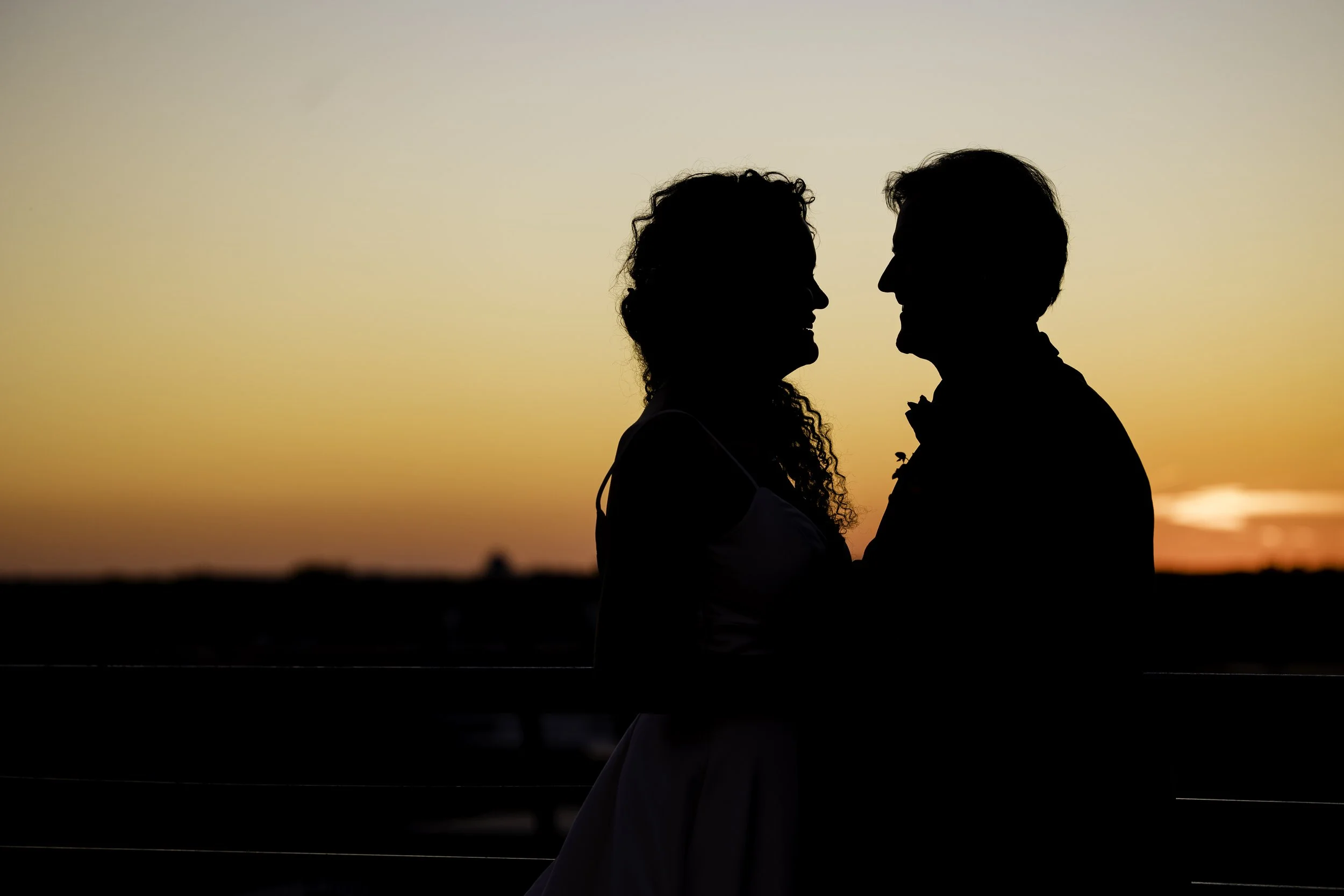 Couple embraced on the rooftop