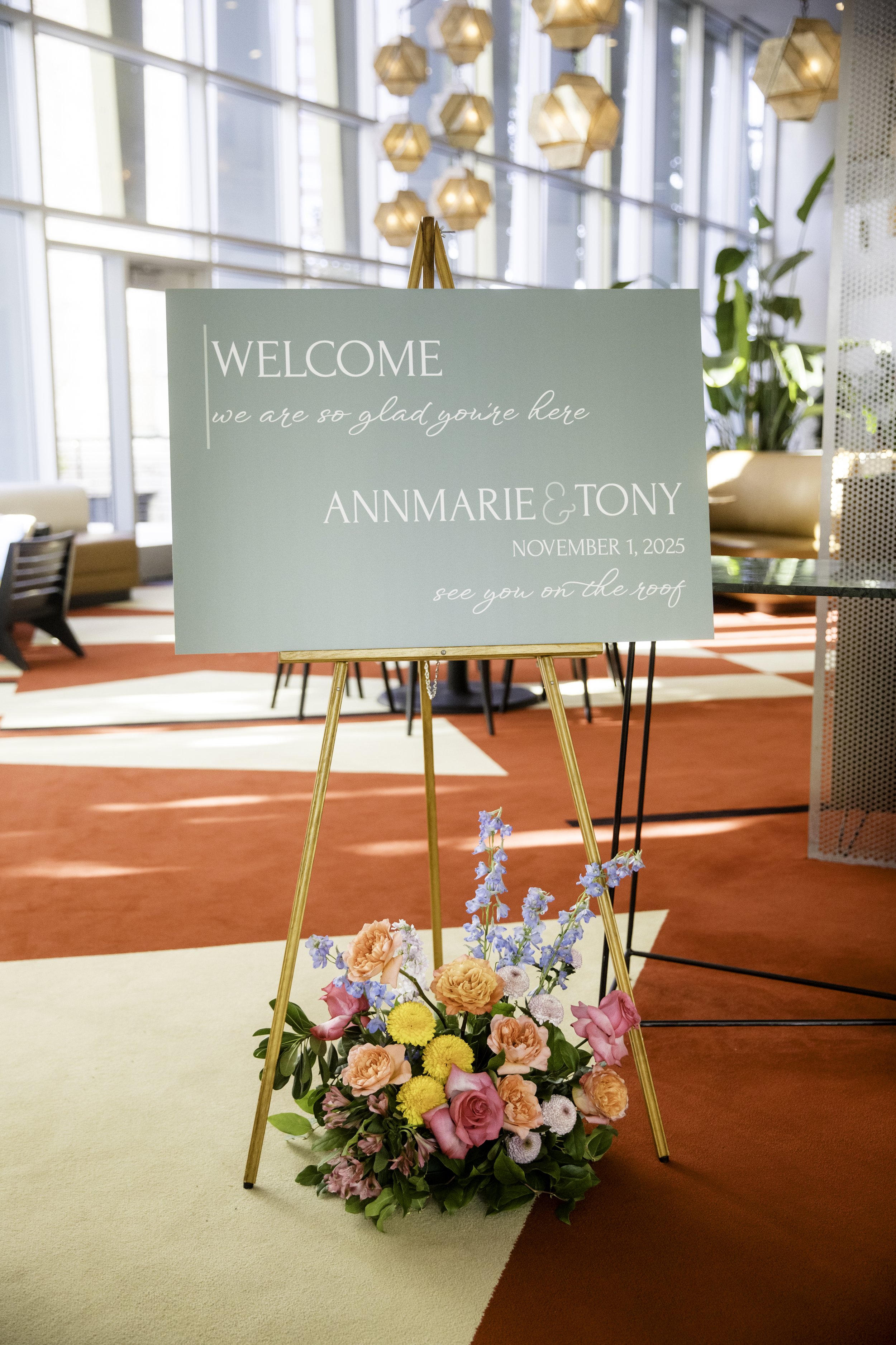 Add-on Services like customized welcome signs, to make an impact. Florals by Bowerbird. Venue The Durham Hotel