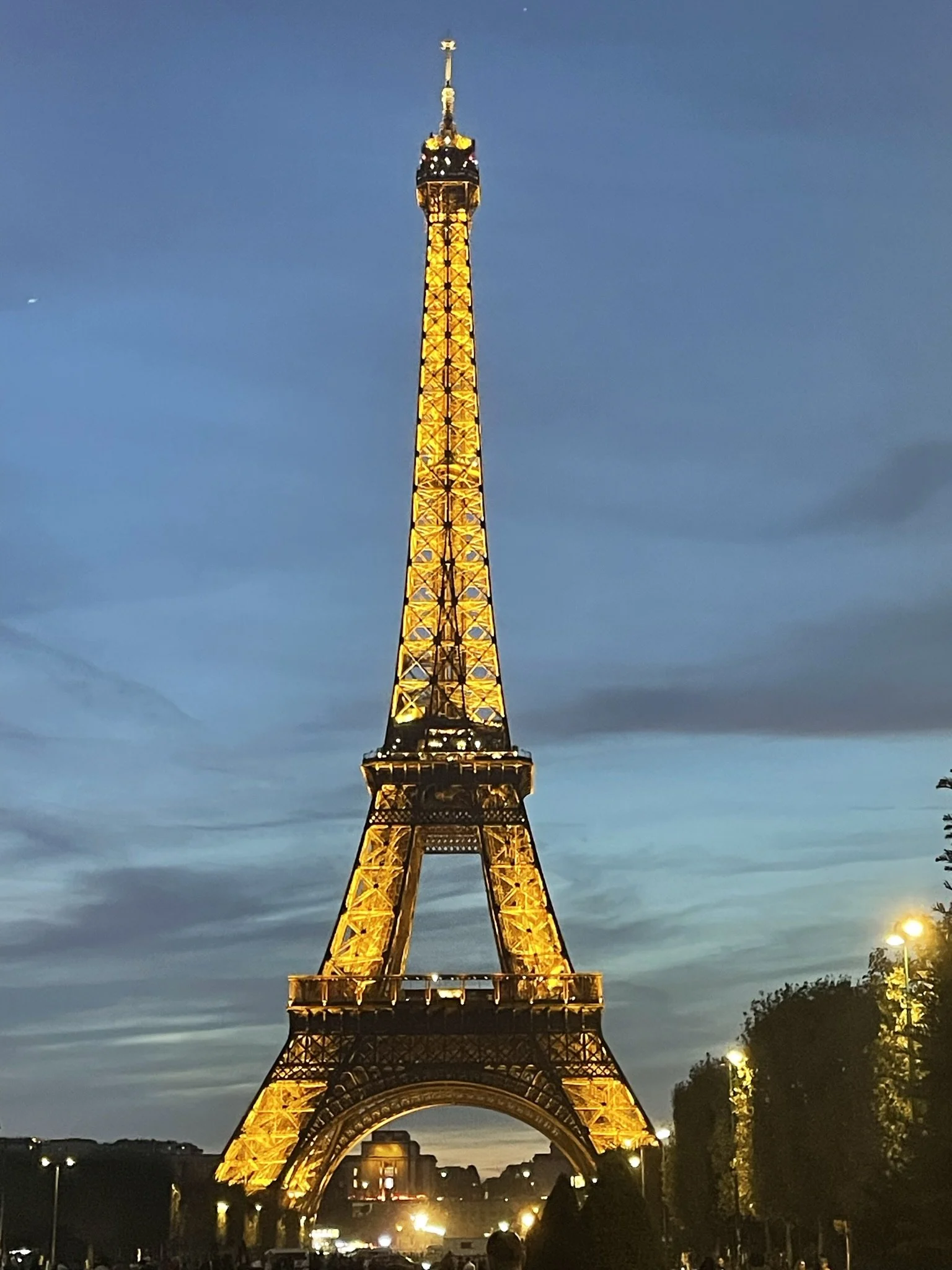 Eiffel Tower lit up at night, Paris France
