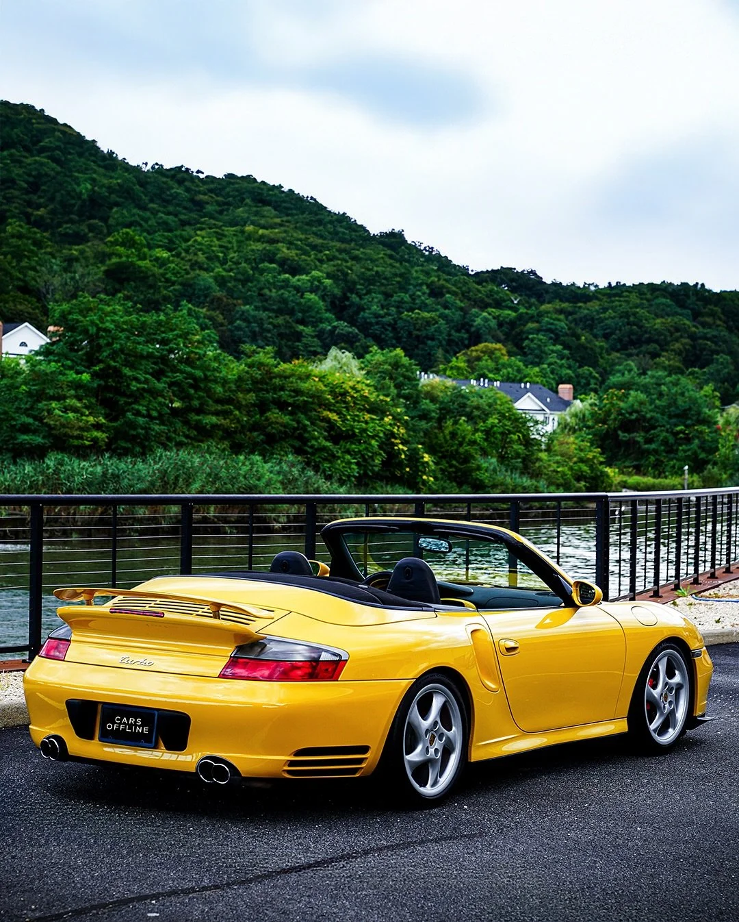 This 2004 Porsche 911 Turbo Cabriolet, presented by Cars Offline, is a striking 996-generation example finished in Speed Yellow over black leather with only 29k miles.

Powered by a twin-turbo flat-six delivering 415 hp through a 6-speed manual and a