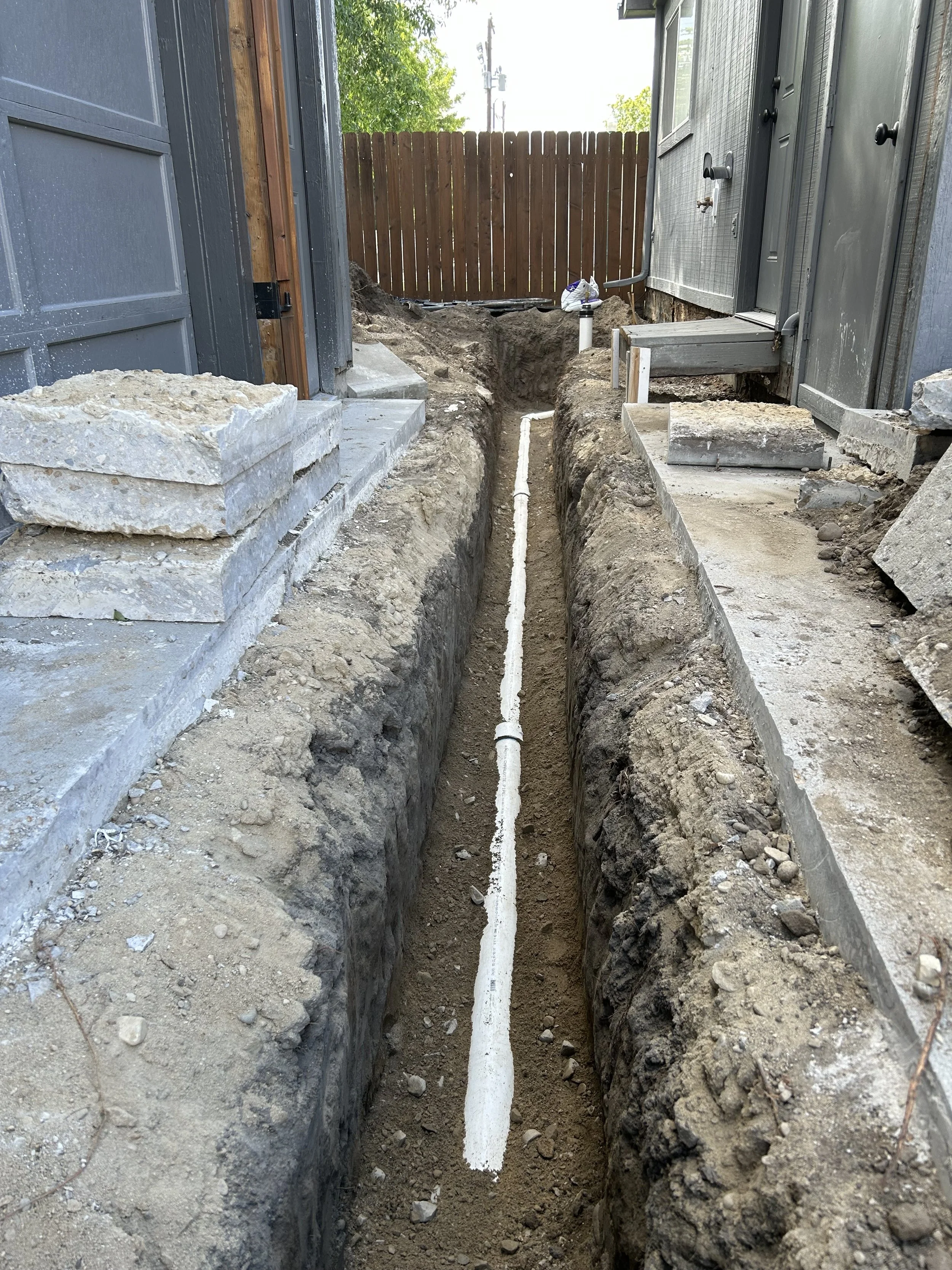 Replace main sewer service to house