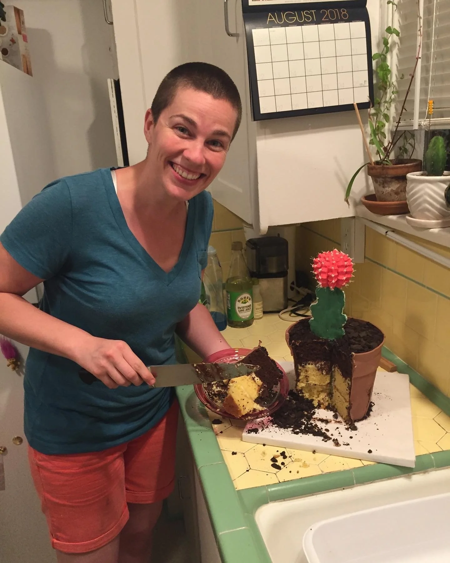 ruby ball cake - cutting.JPG