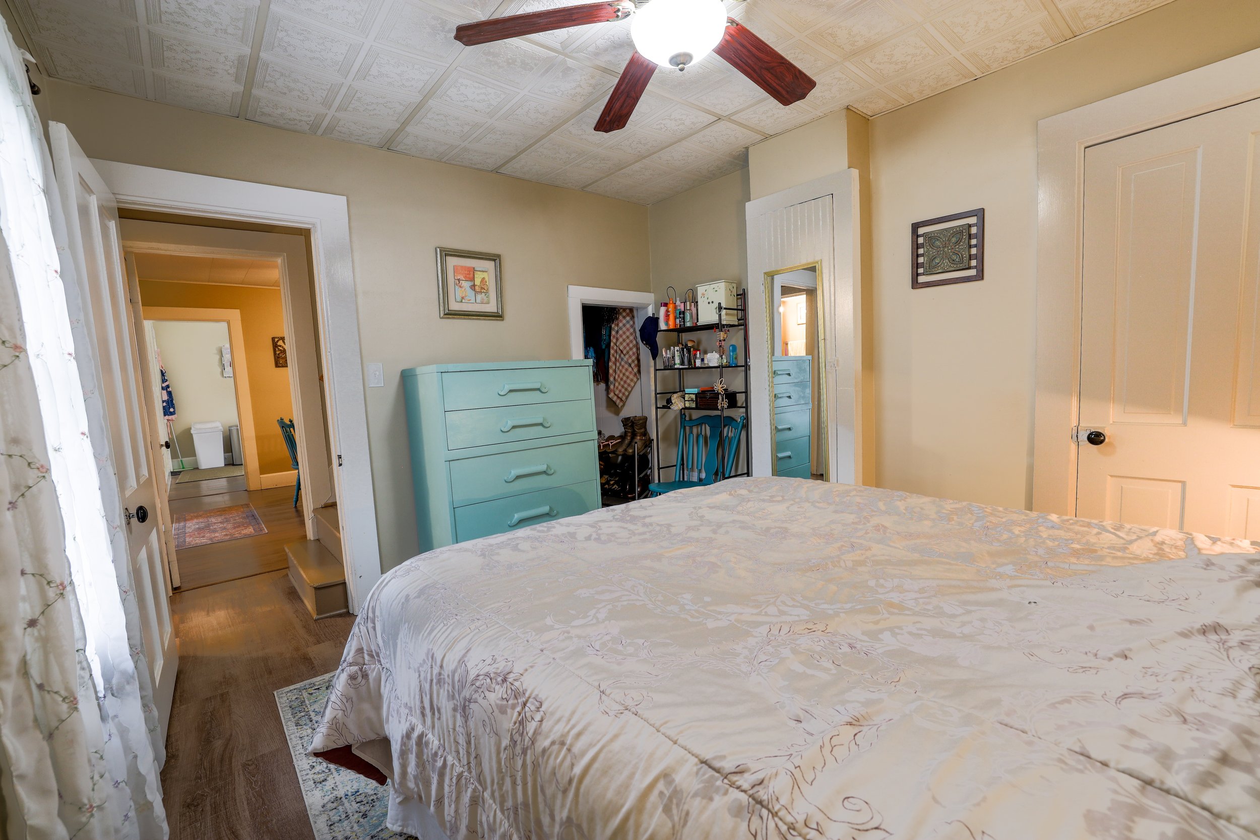 Main Floor Bedroom looking out towards hallway.jpg