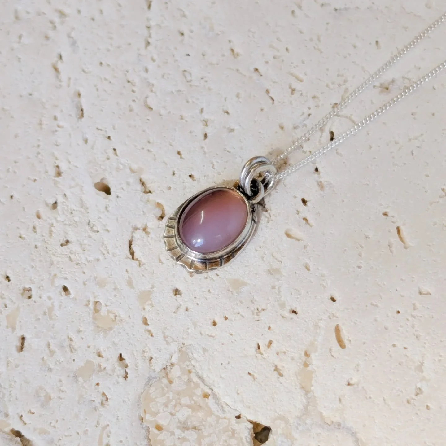 I've just added this one to my website, this natural  Botswana agate is so beautiful and has a lovely ombre pink! 

I've done a soft scalloped edge and some fine line detailing at the bottom 🩷

#handmadejewelleryuk #slowmadejewelry #agatejewellery #