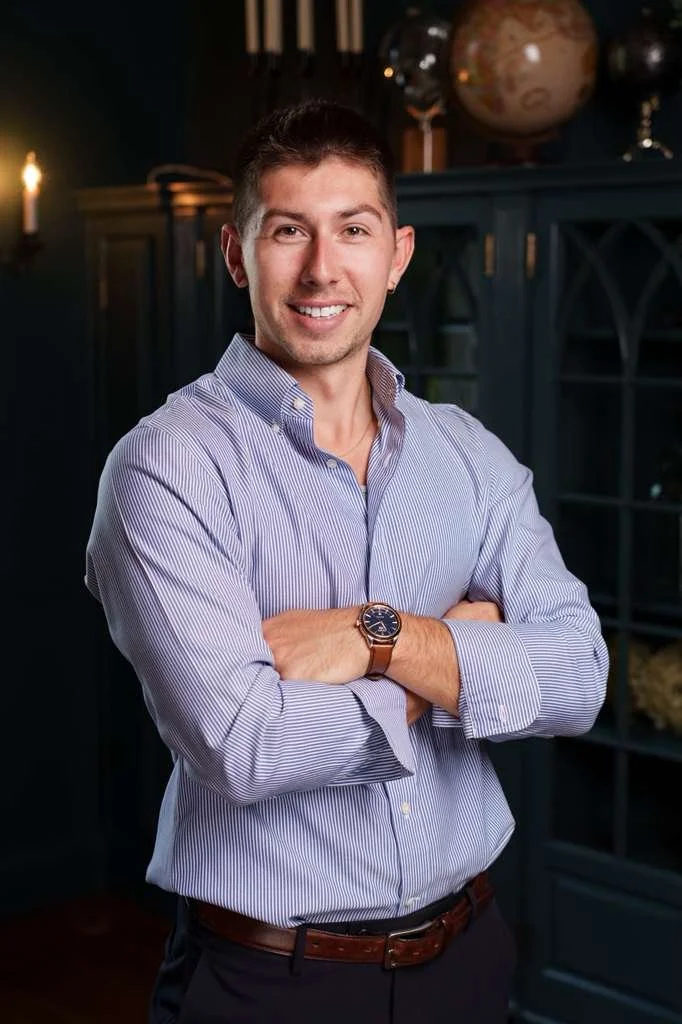 A photo of Tyler Hartman. Bohemia Manor Farm's Revenue Director of Wine Sales.