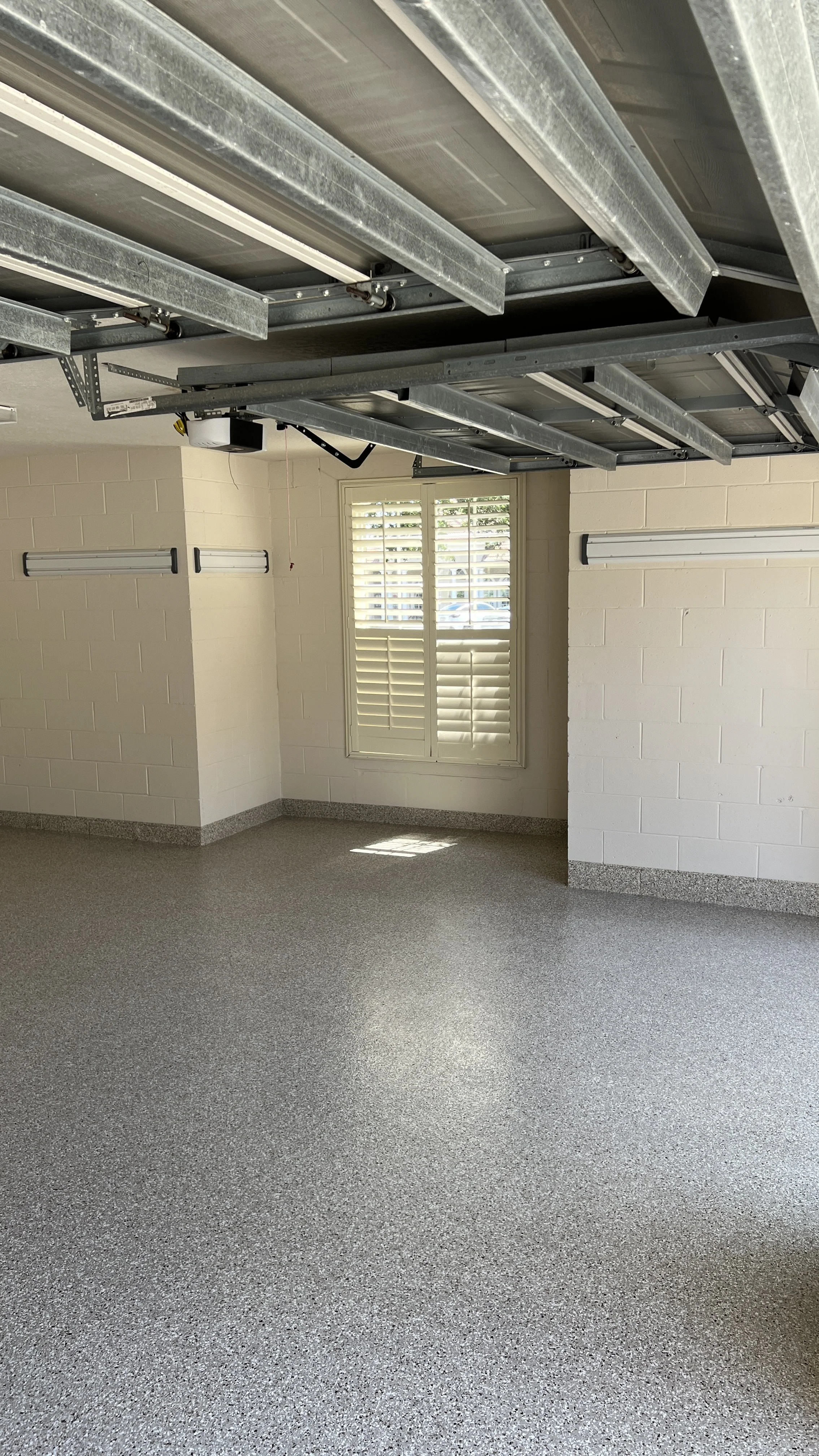Case Study: A Windermere Family Transforms Their Garage from Dingy and Patchy to Functional and Beautiful