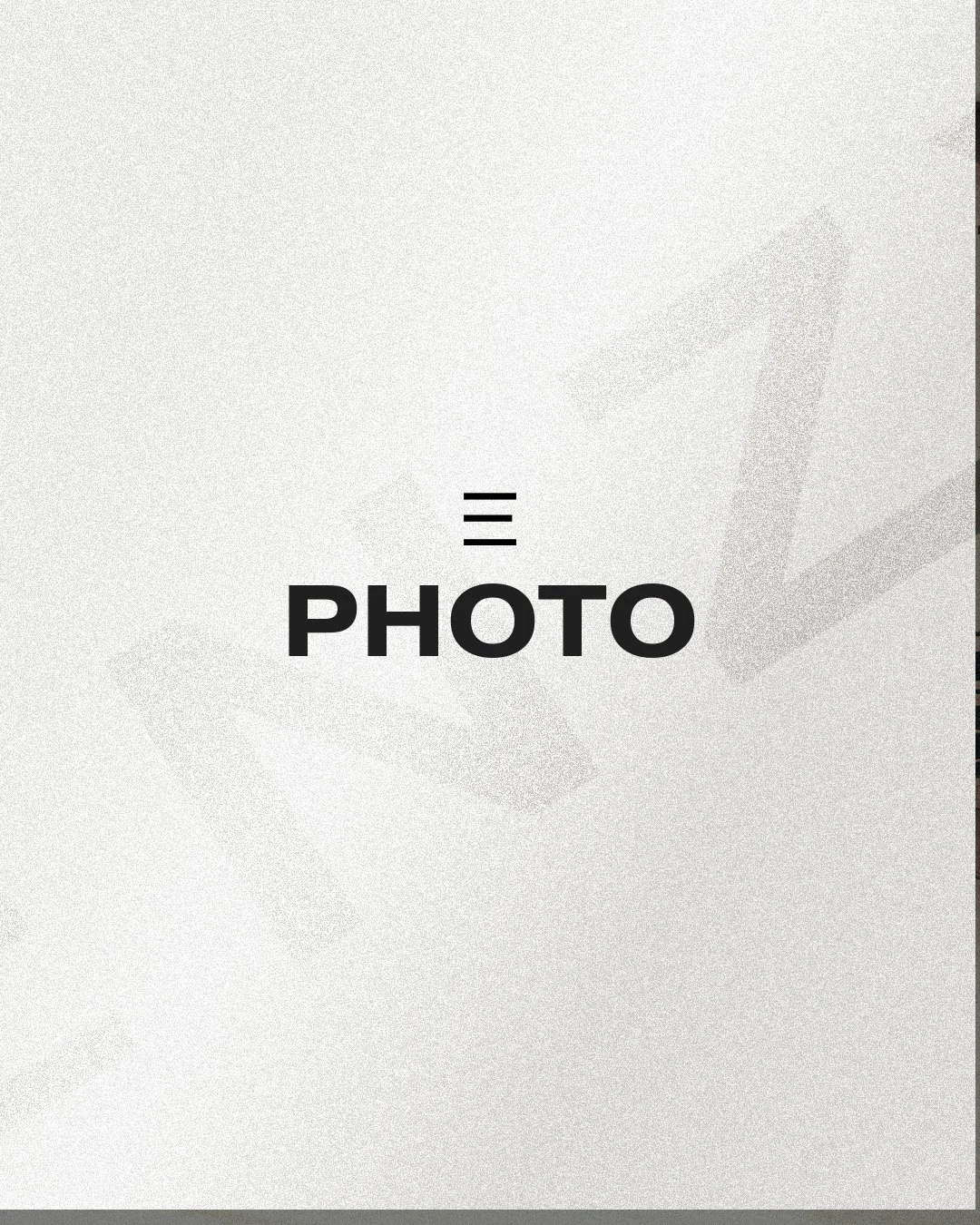 Faded text background with the word "PHOTO" in bold on a textured surface.