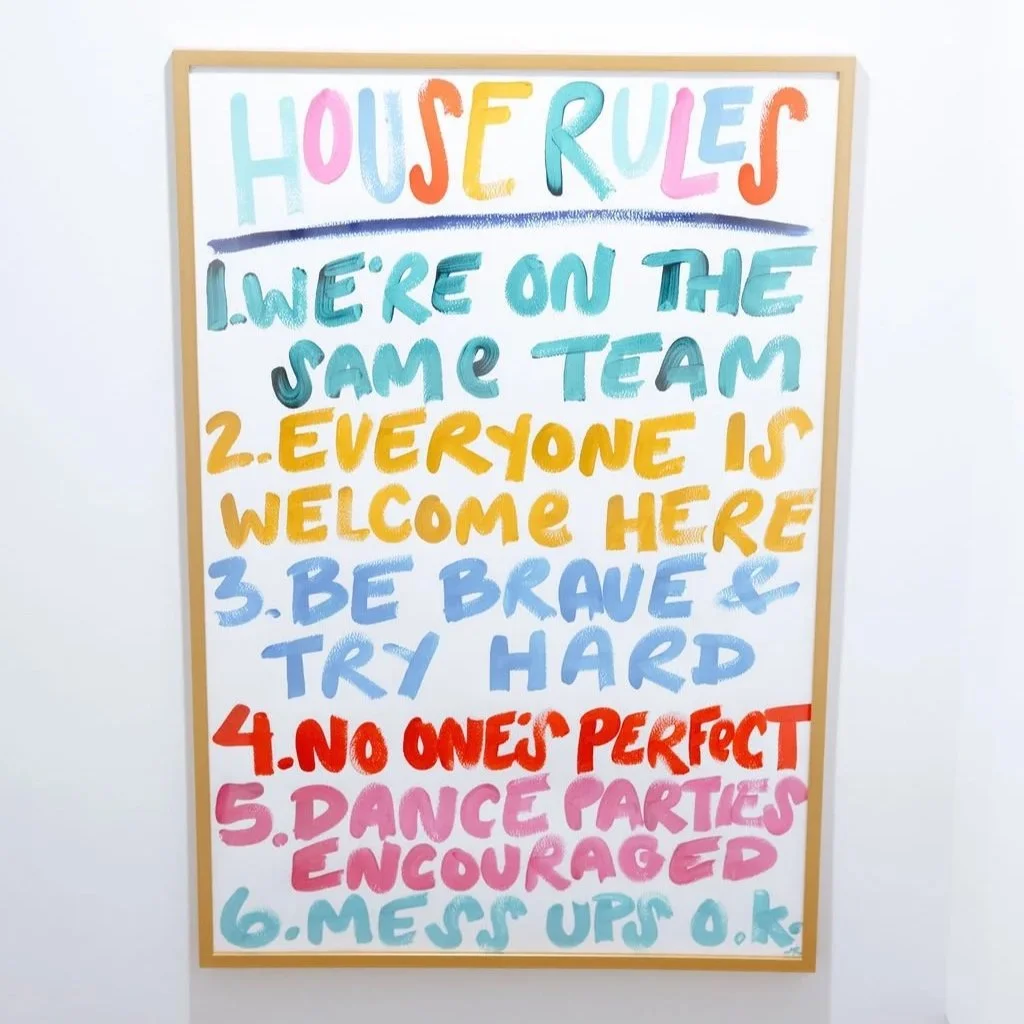 Colorful artwork listing "House Rules" for a custom playroom 
