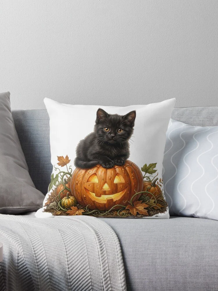 Little Black Kitten on Halloween Jack-O-Lantern