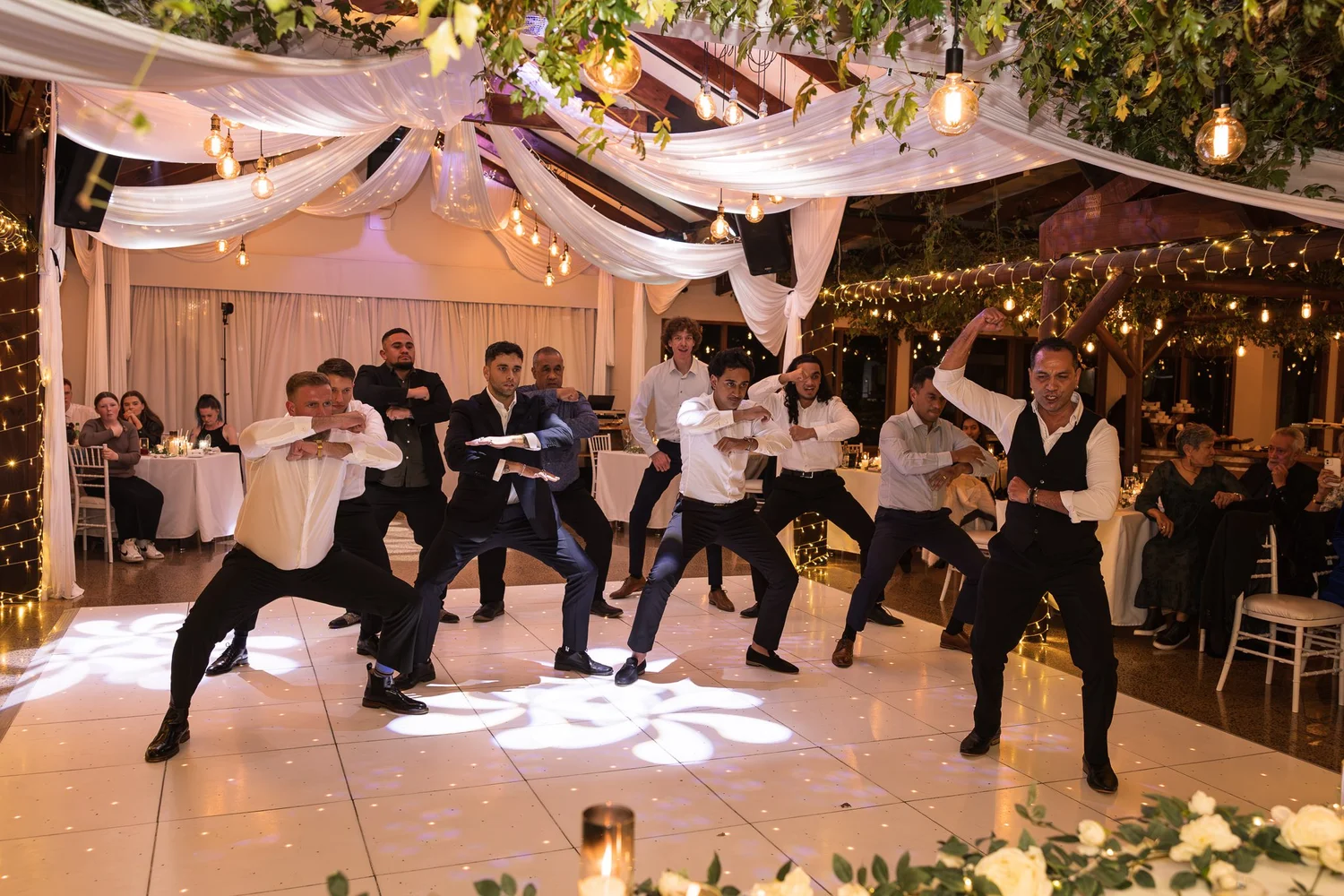 Guests perform a haka on the dance floor