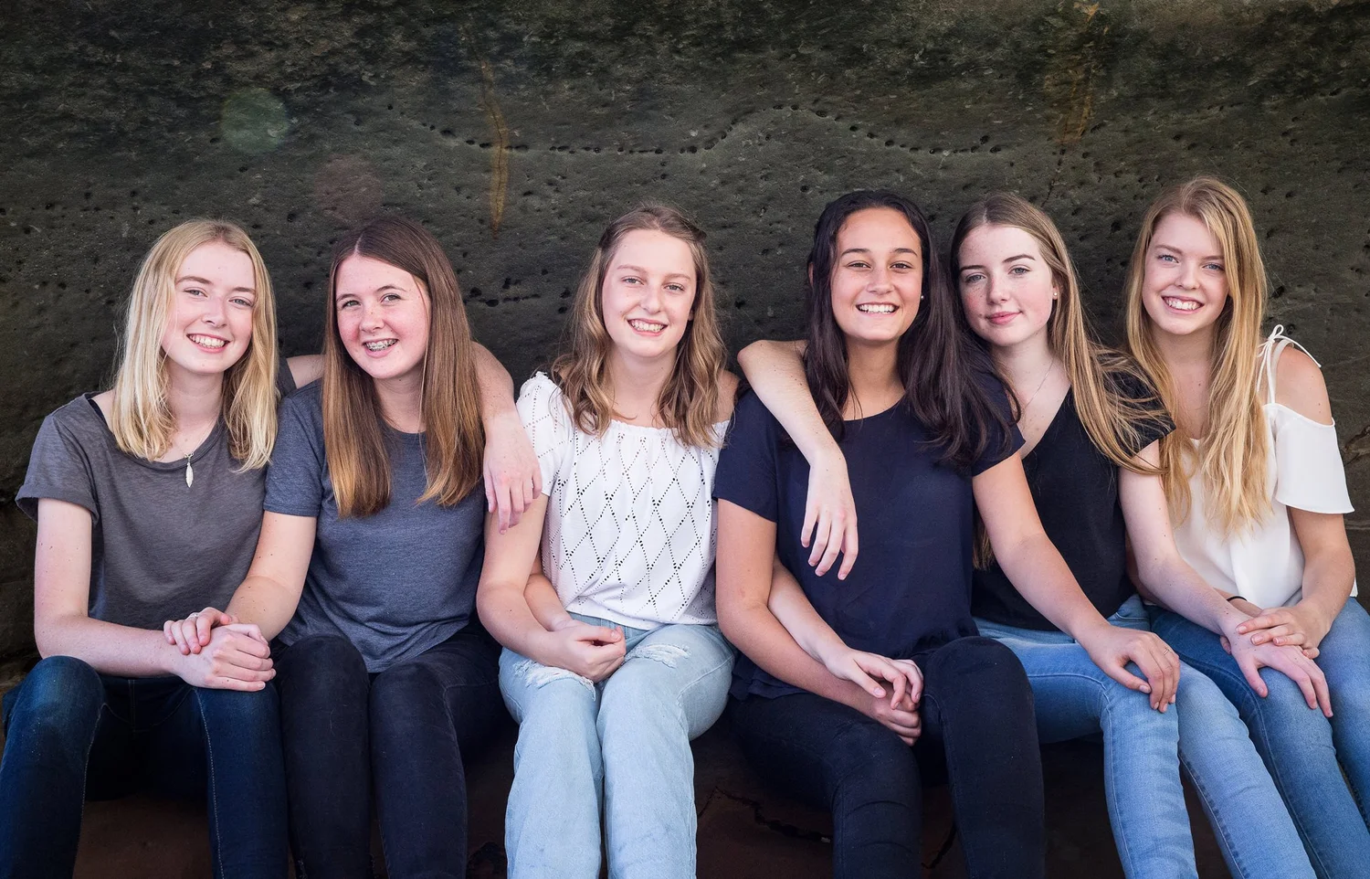 A group of teenage cousins sitting together