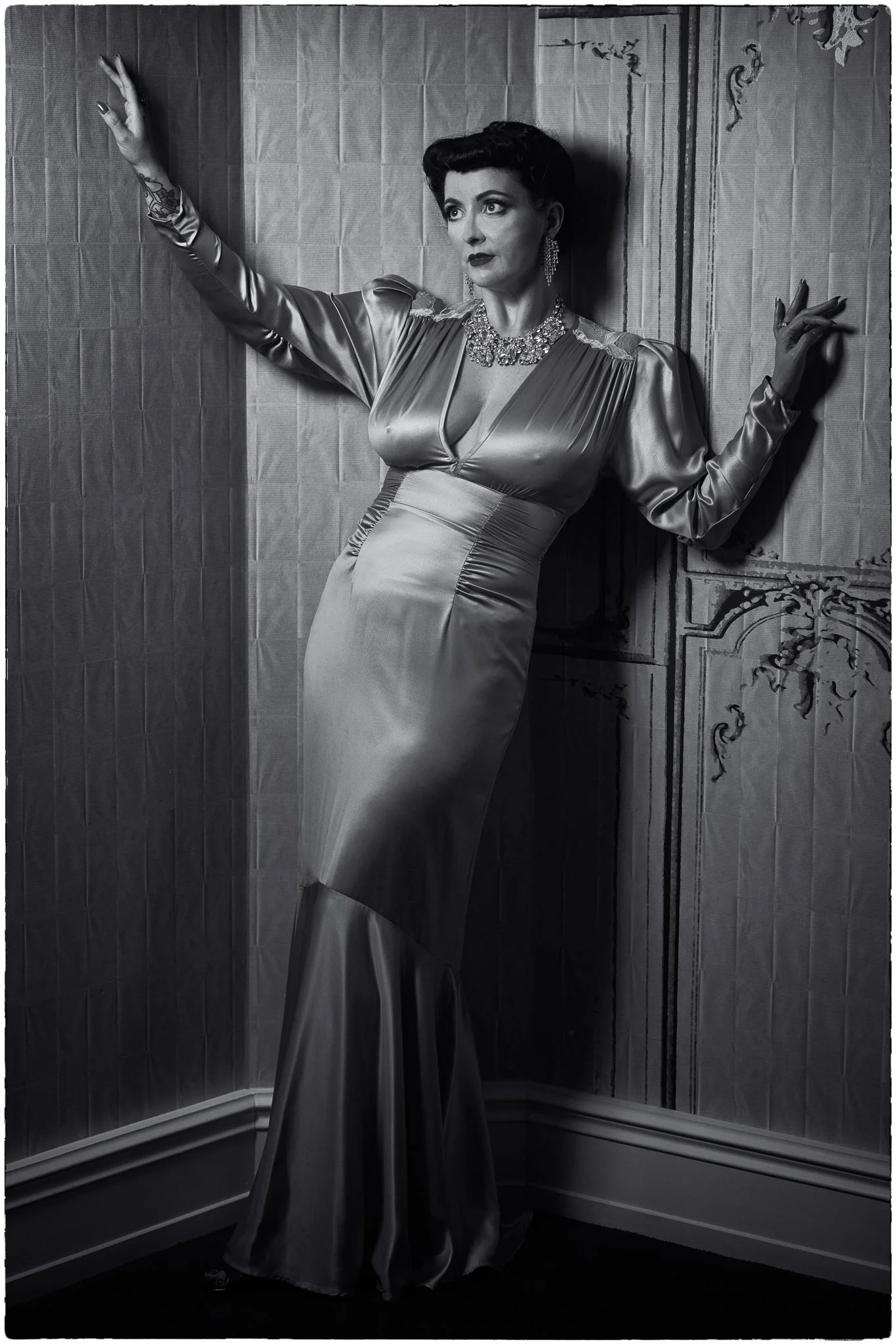 Black and white photo of Viv in a satin gown