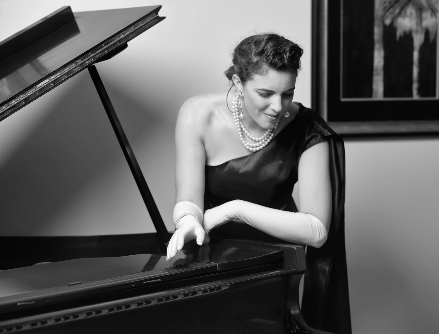 Black and white photo of Jay at the piano