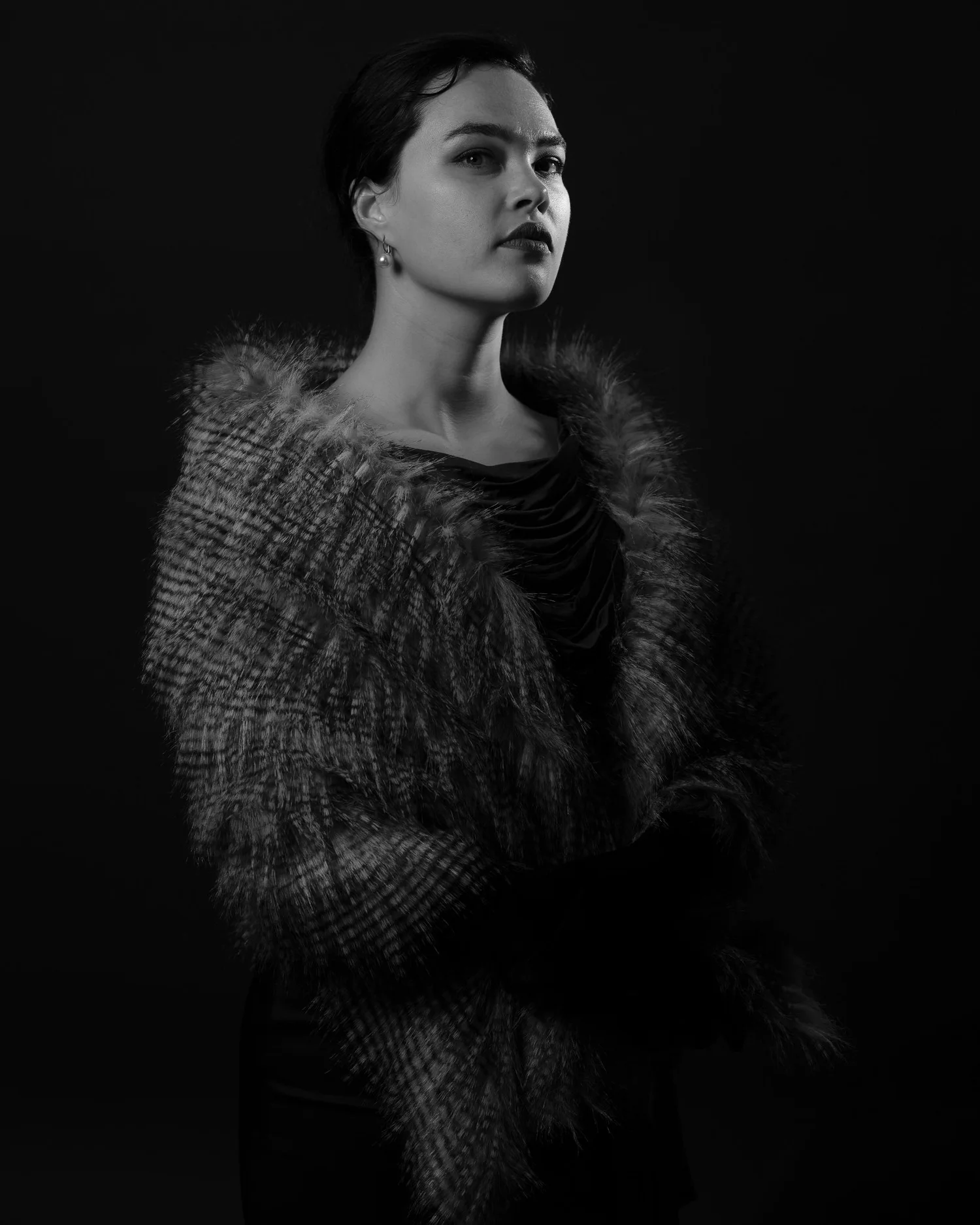 Black and white portrait of Anita in a fur stole