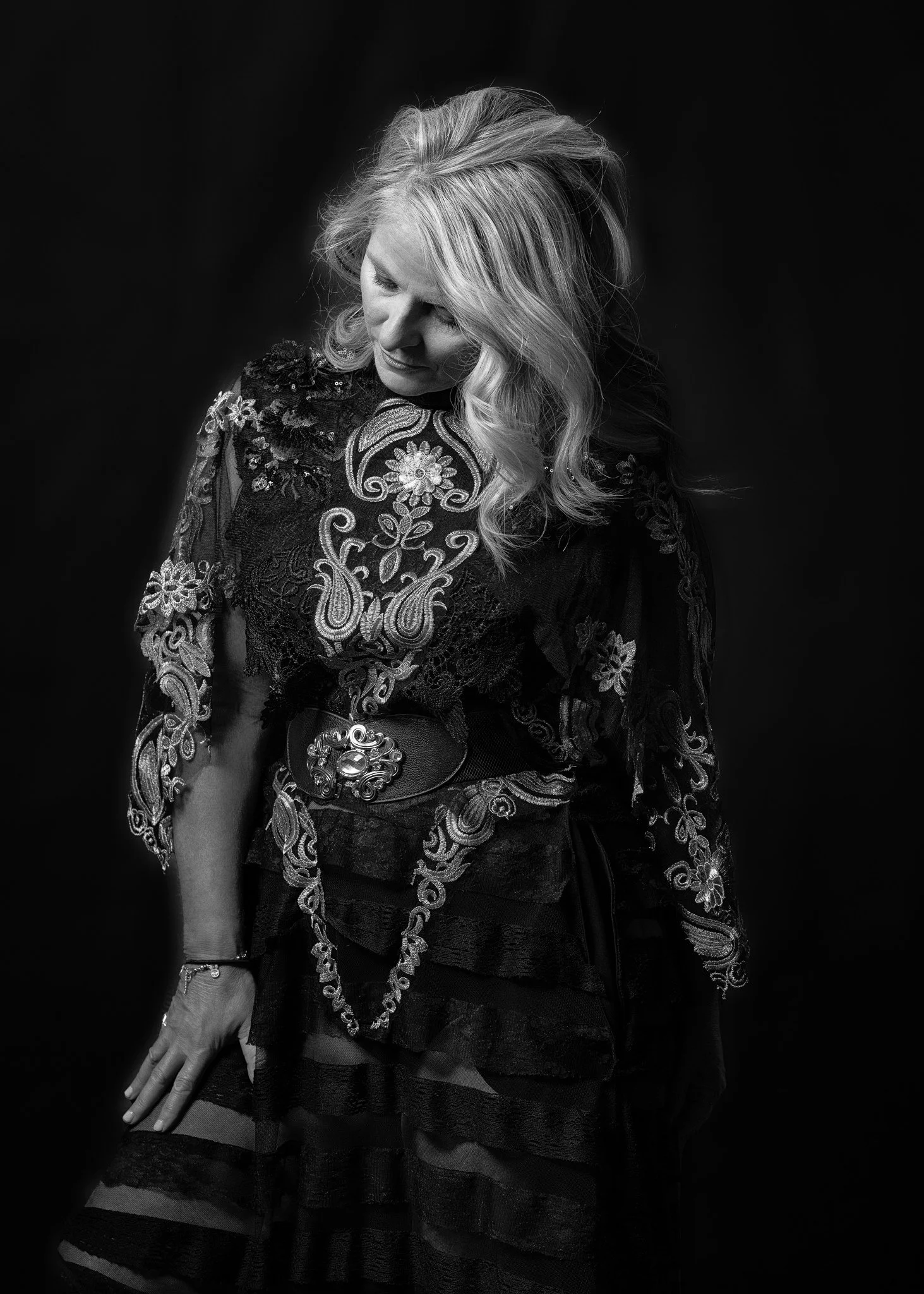 Black and white photo of Ivanka in an embroidered lace gown