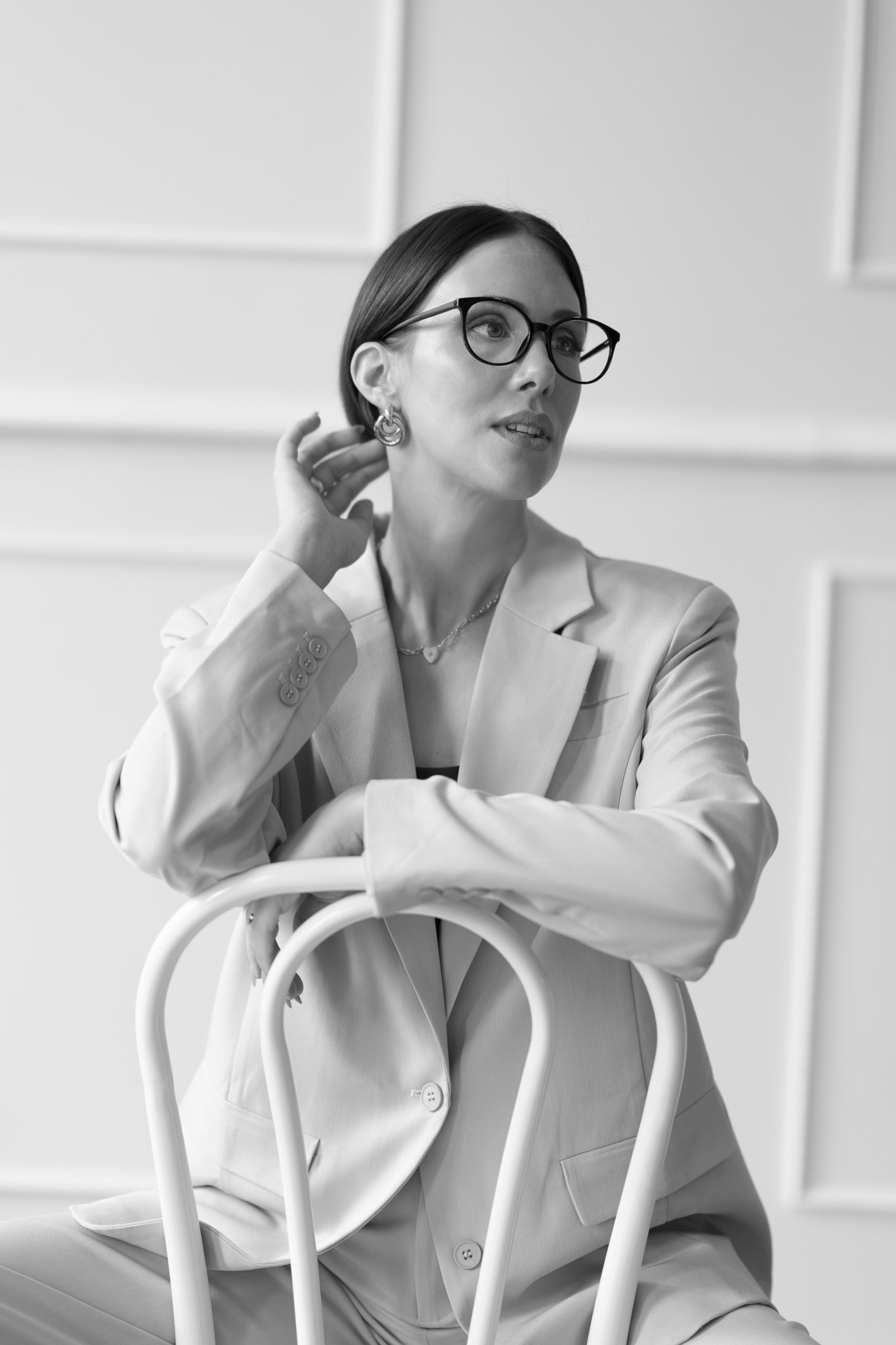 Black and white photo of Nat in glasses