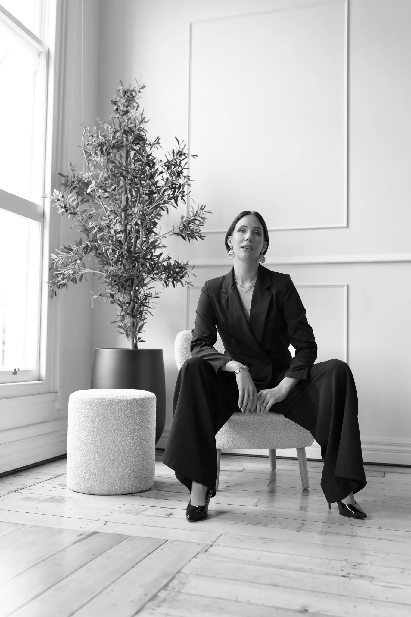 Black and white photo of Nat looking upwards