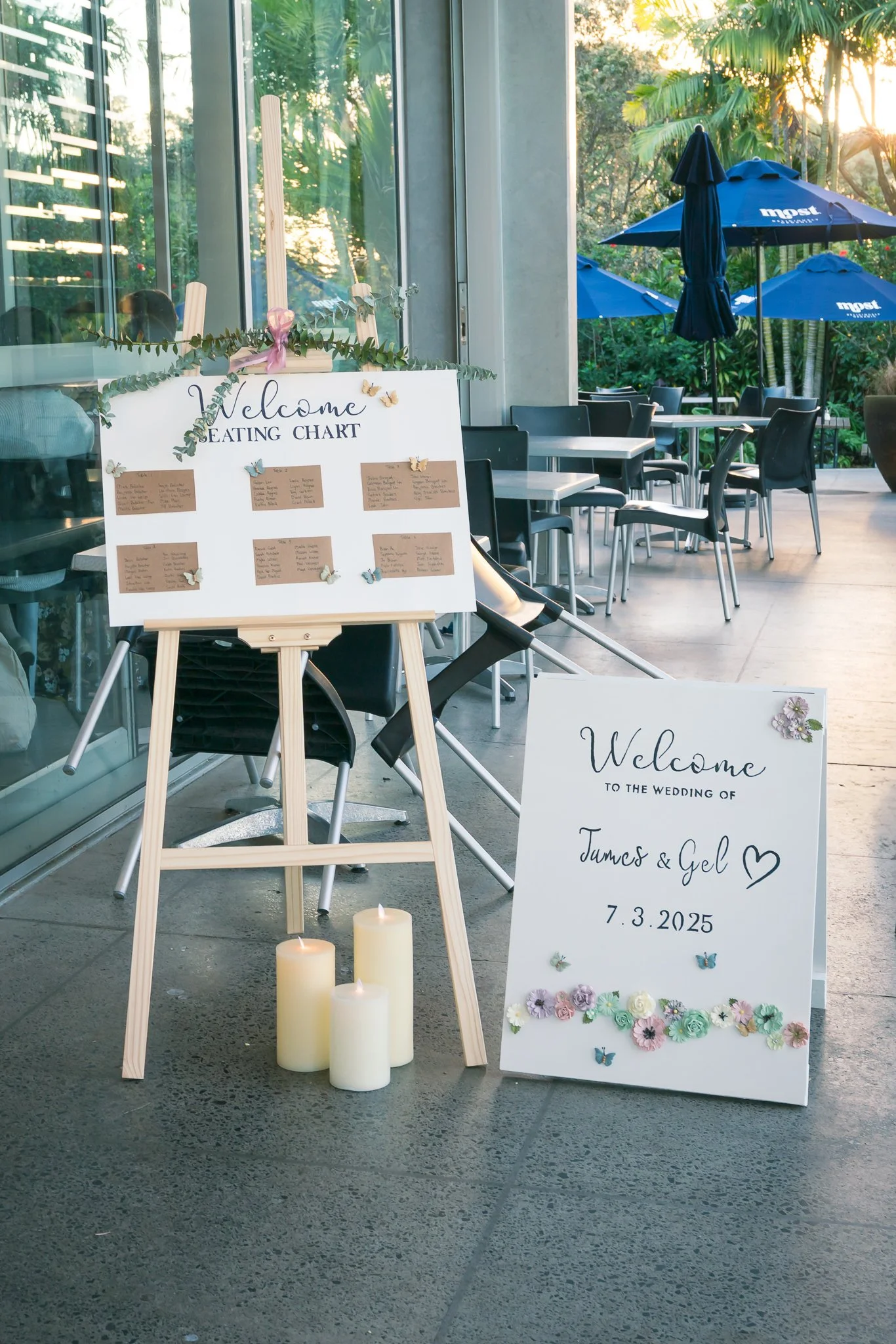 The welcome sign and seating chart at the reception