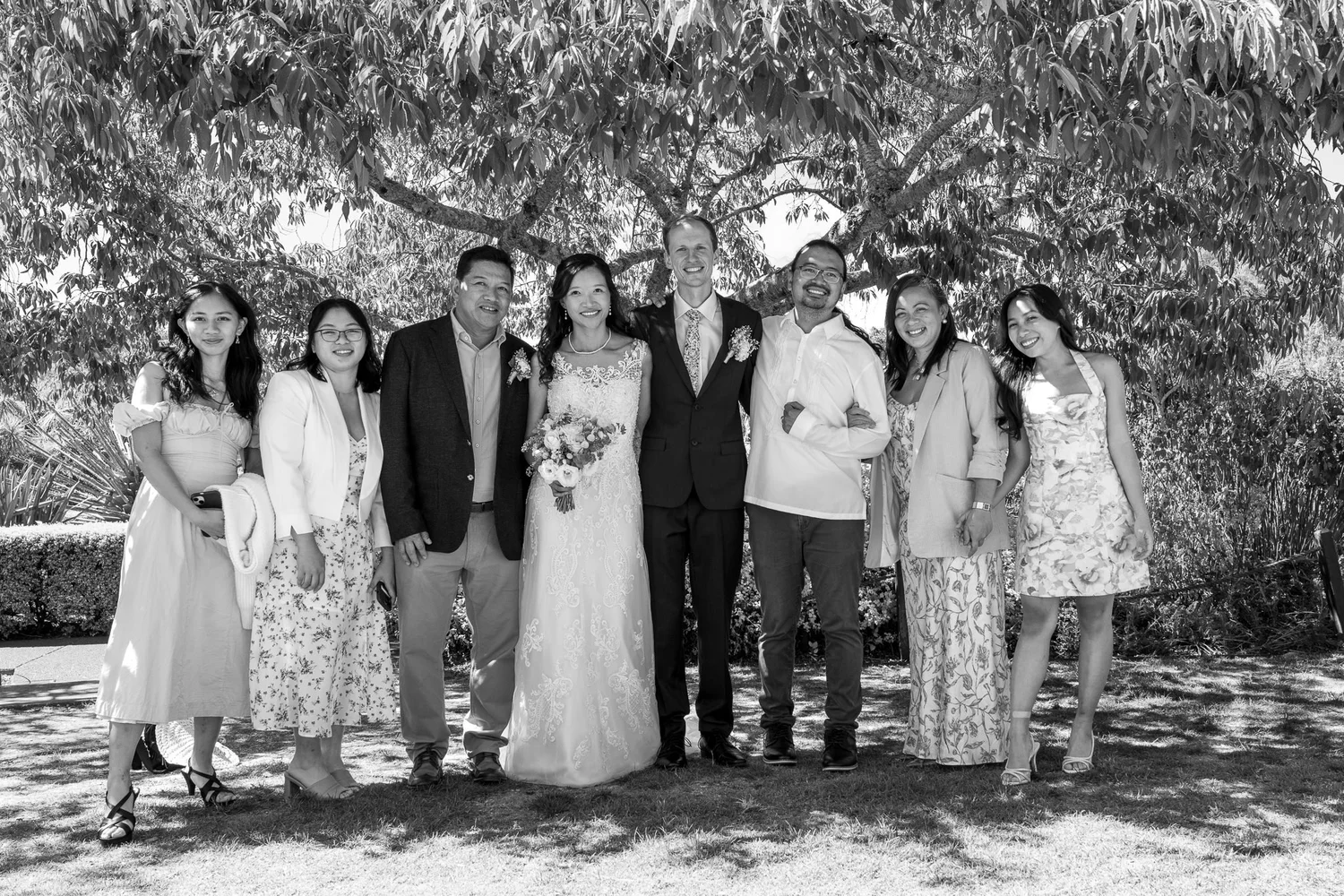 Black and white photo of Gel and James with family