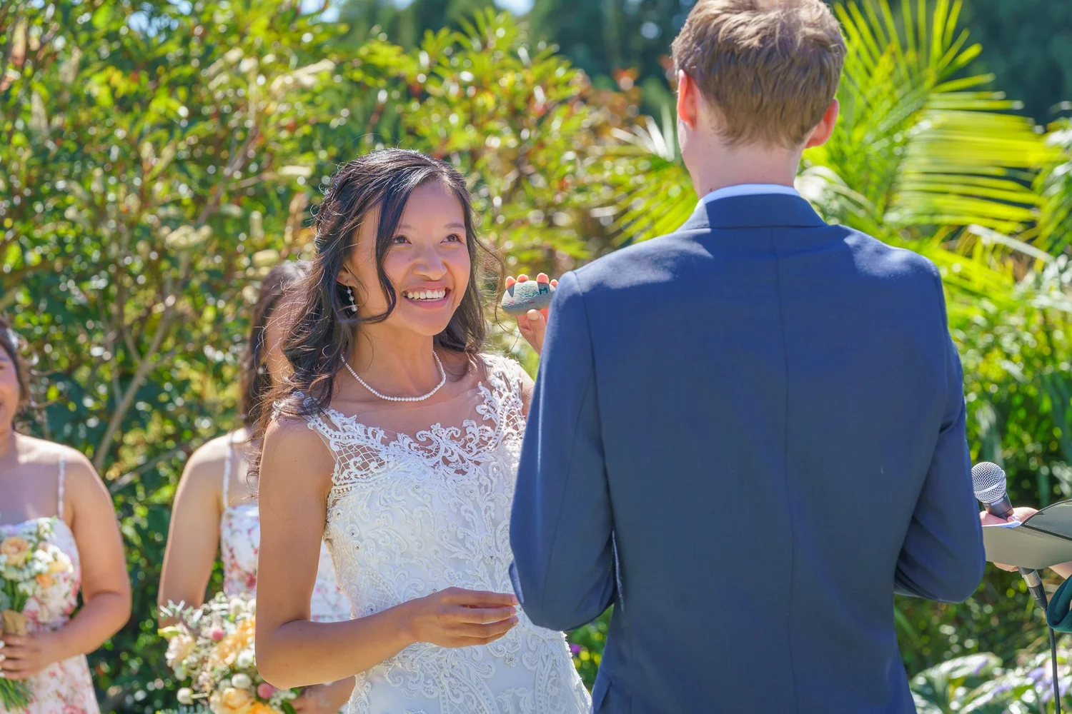Gel smiles at James during the ceremony