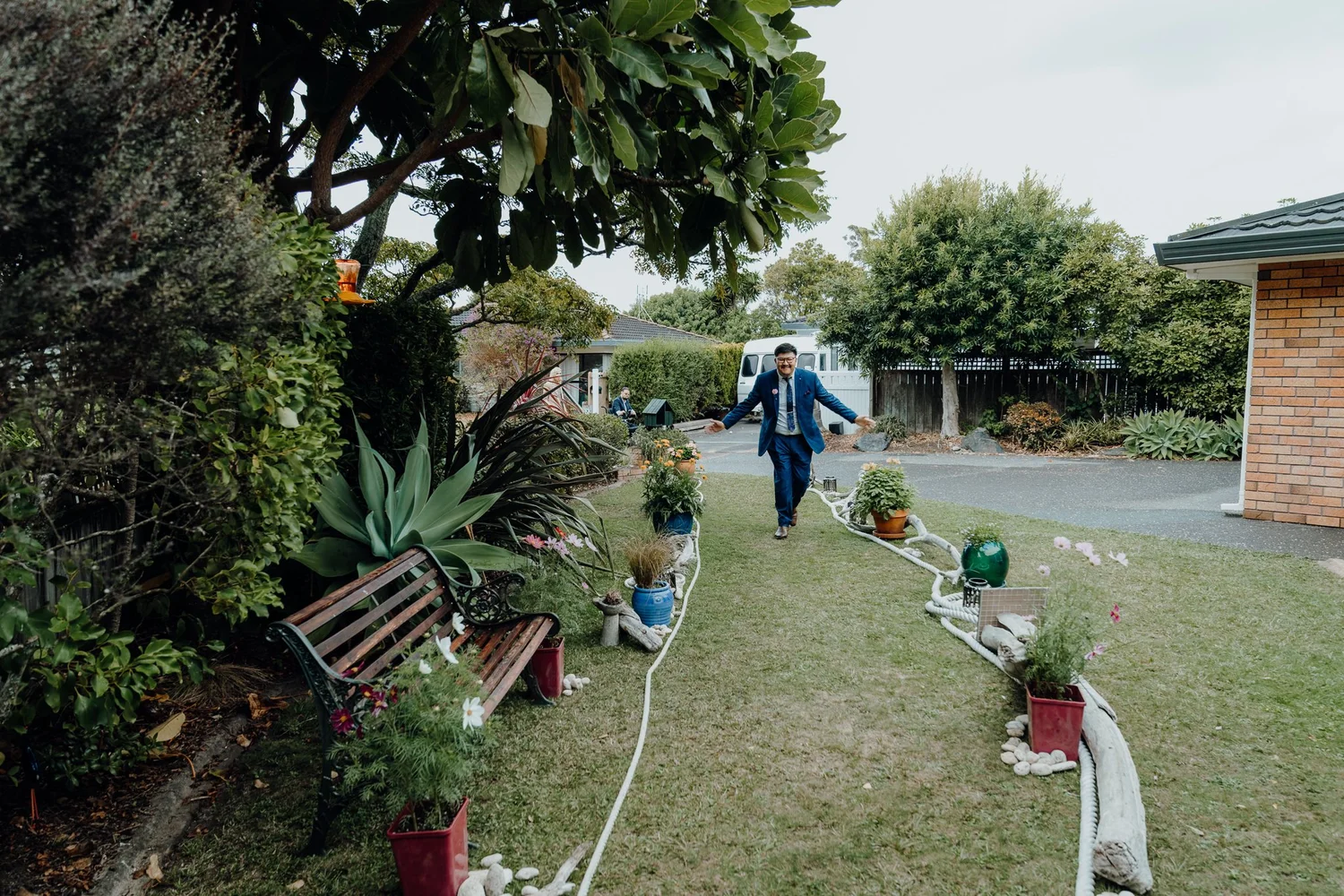 A guest walks across the garden