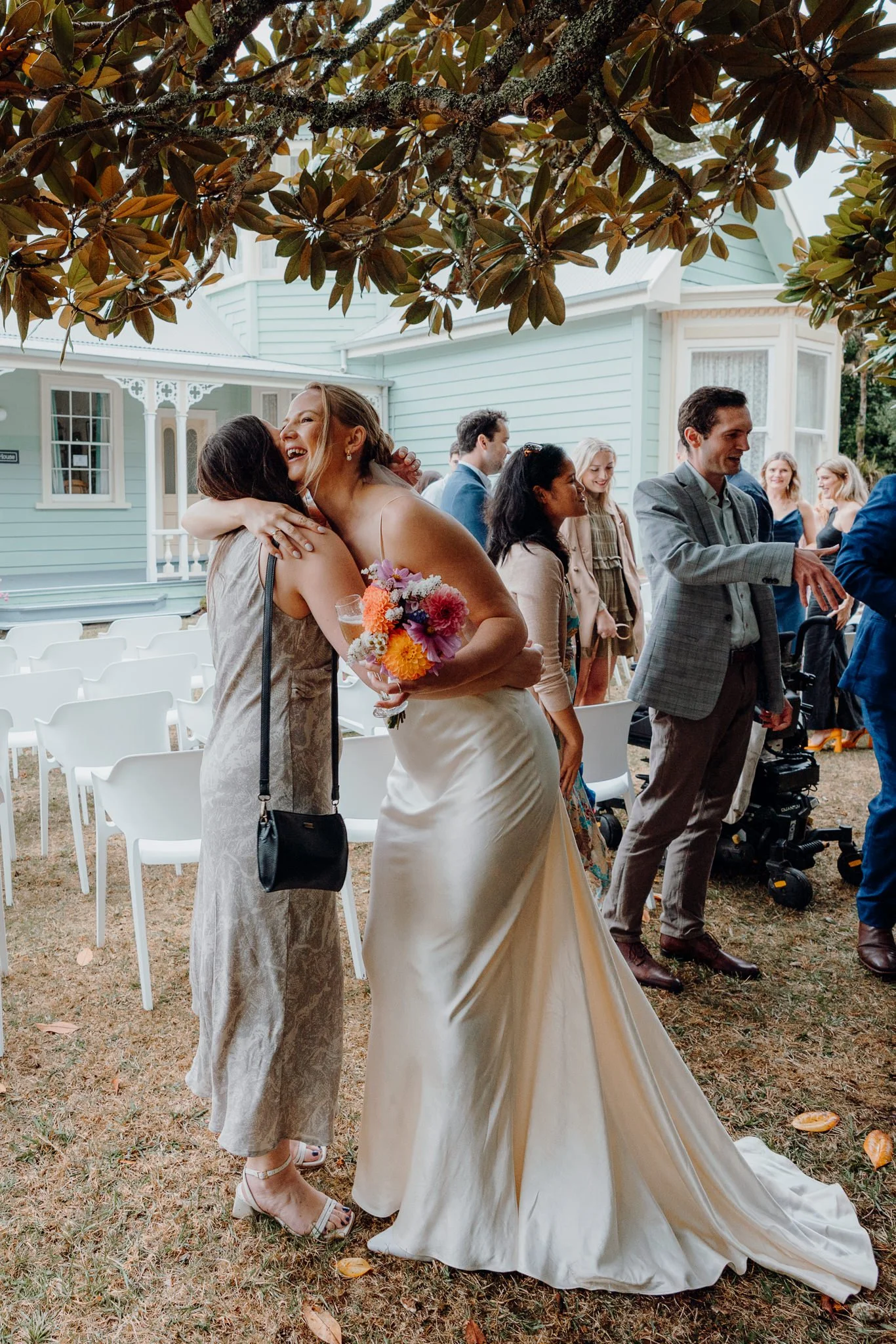 Rebecca hugs a guest after the ceremony
