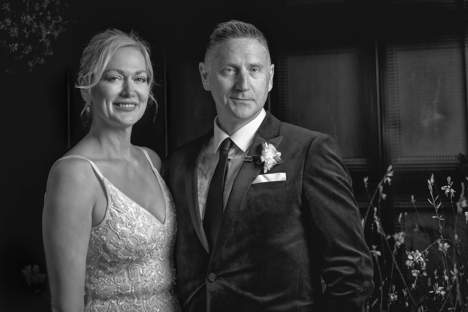 Black and white low-light portrait of Shannon and Darren