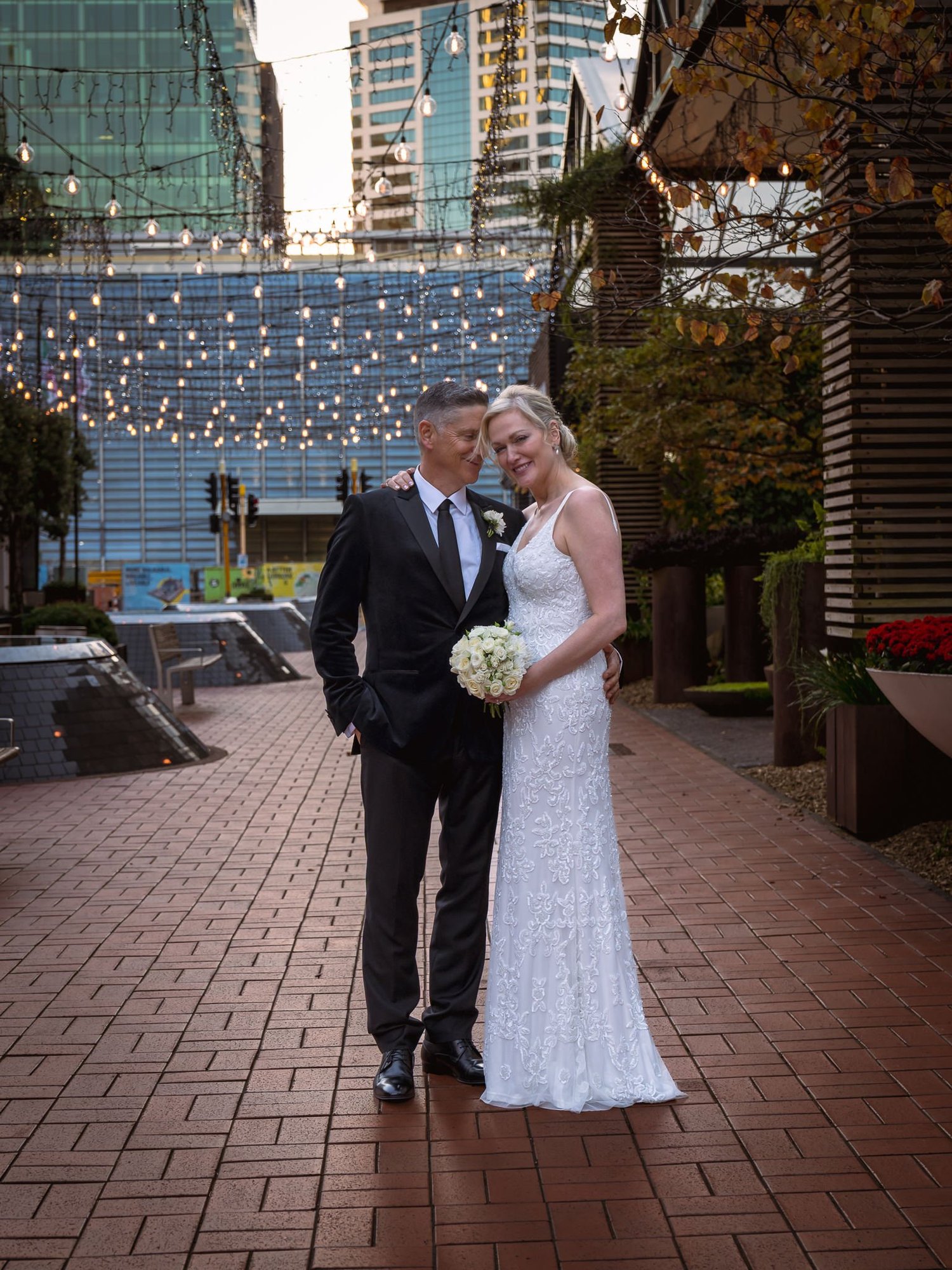 Shannon and Darren with city towers behind