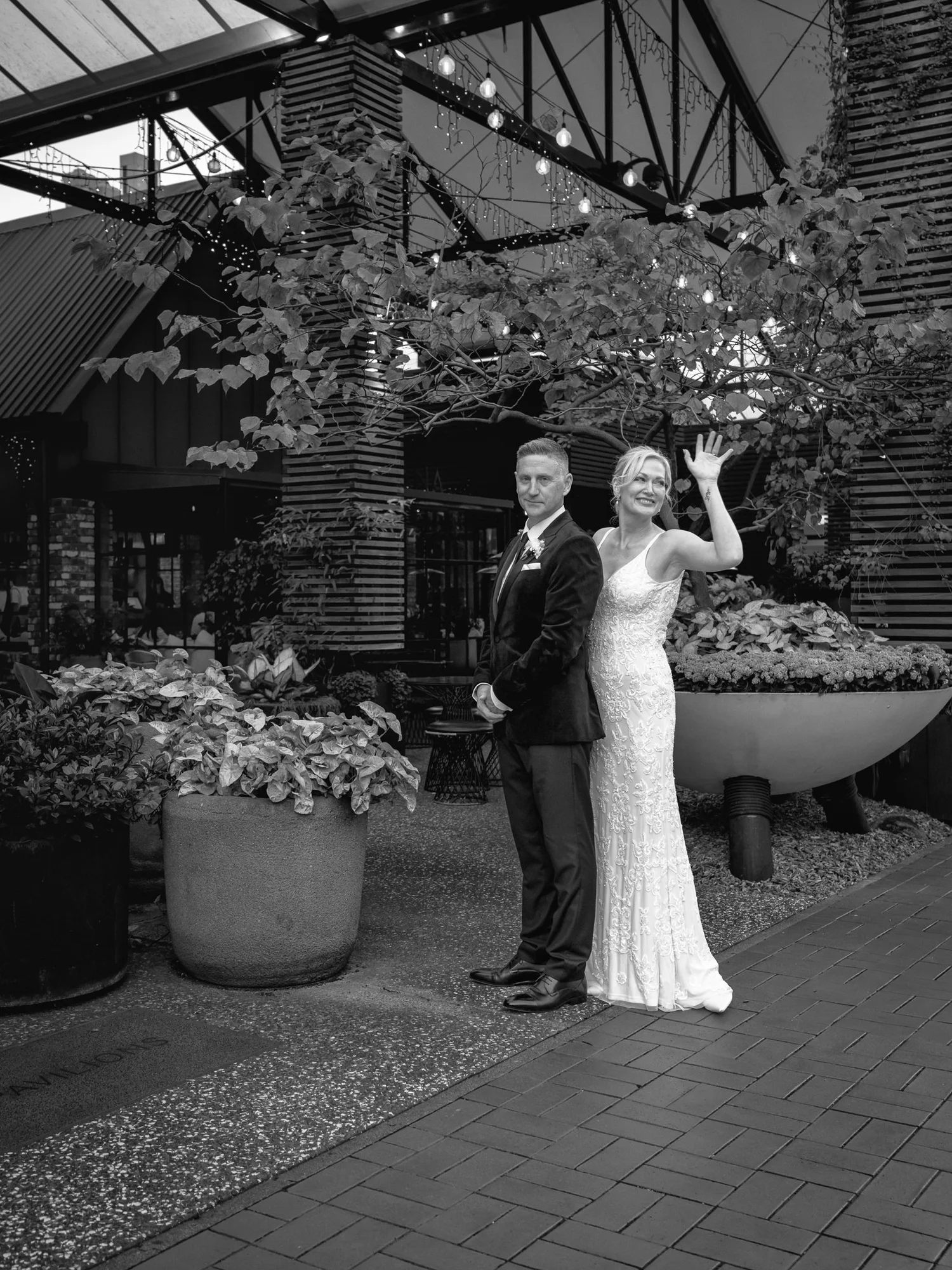 Black and white photo of Shannon waving