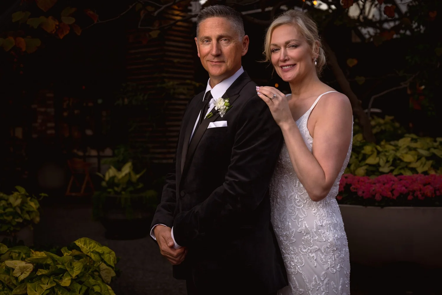 Shannon and Darren pose among the greenery