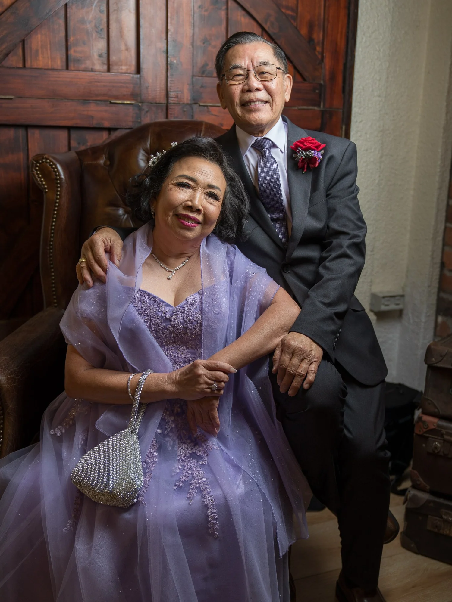 Two guests seated together for a portrait