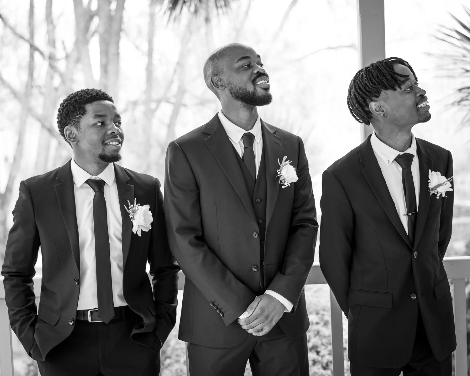 Black and white photo of Foster and his groomsmen