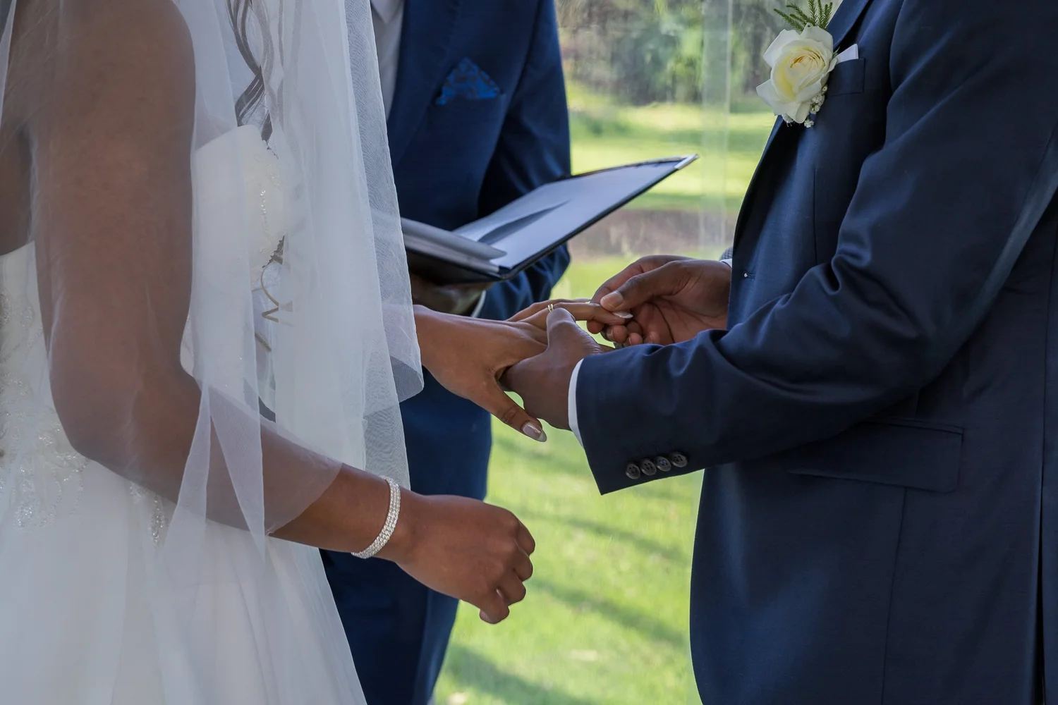 Chiedza and Foster exchange rings during the ceremony