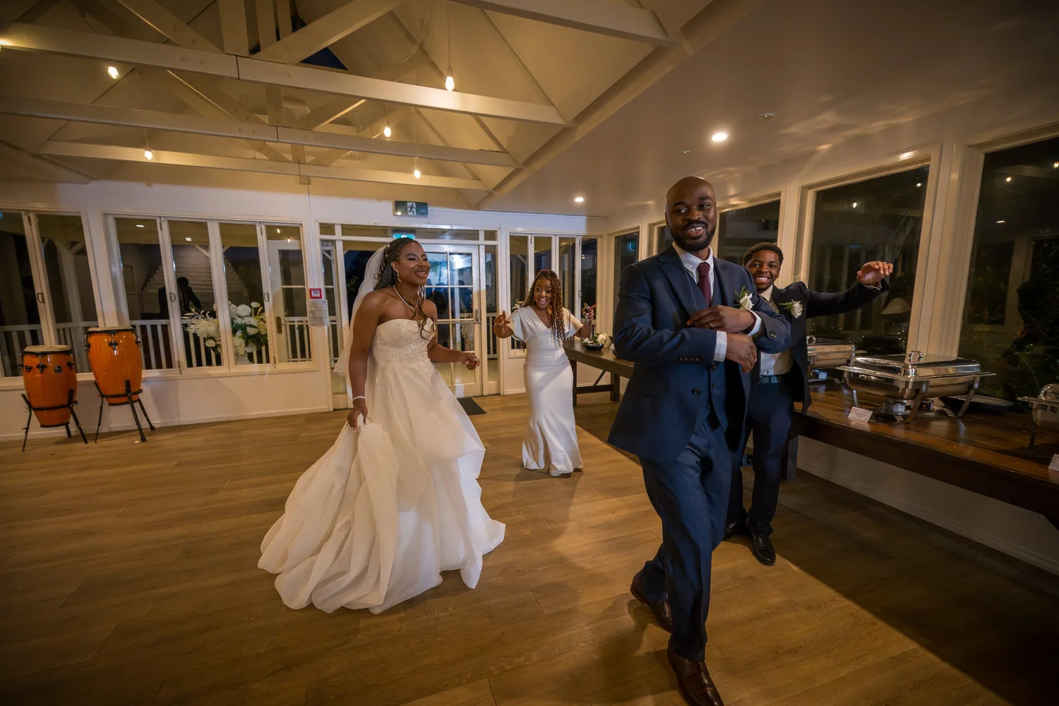 Chiedza and Foster dance into the reception hall