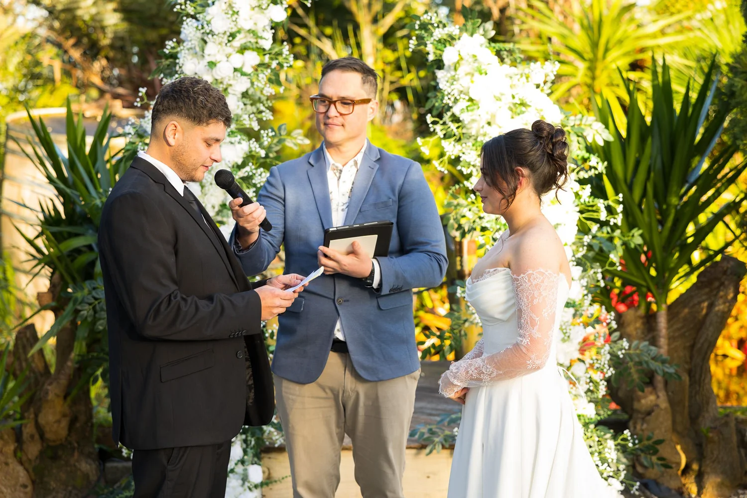 Connor reads his vows to Paige beside the celebrant