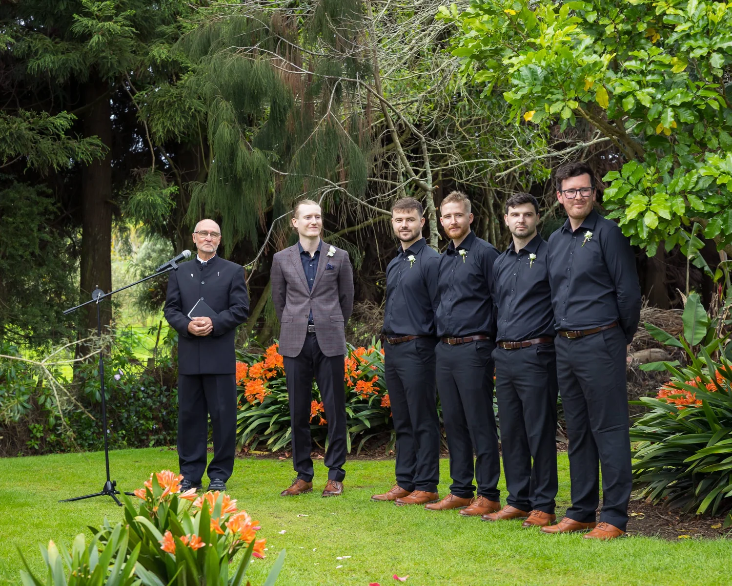 Connor and his groomsmen wait in the garden