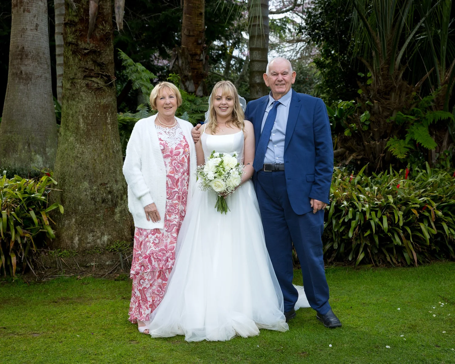 Shannon with two family members in the garden