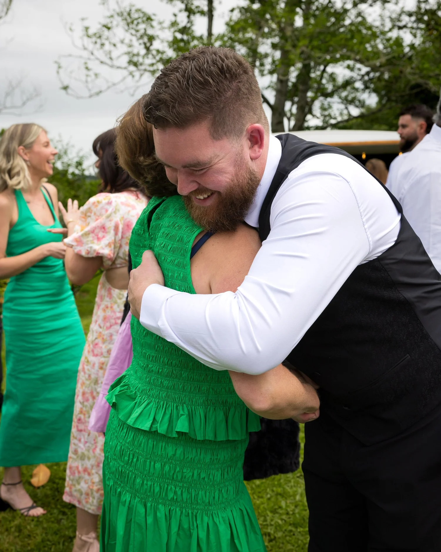 Kyle hugs a guest after the ceremony