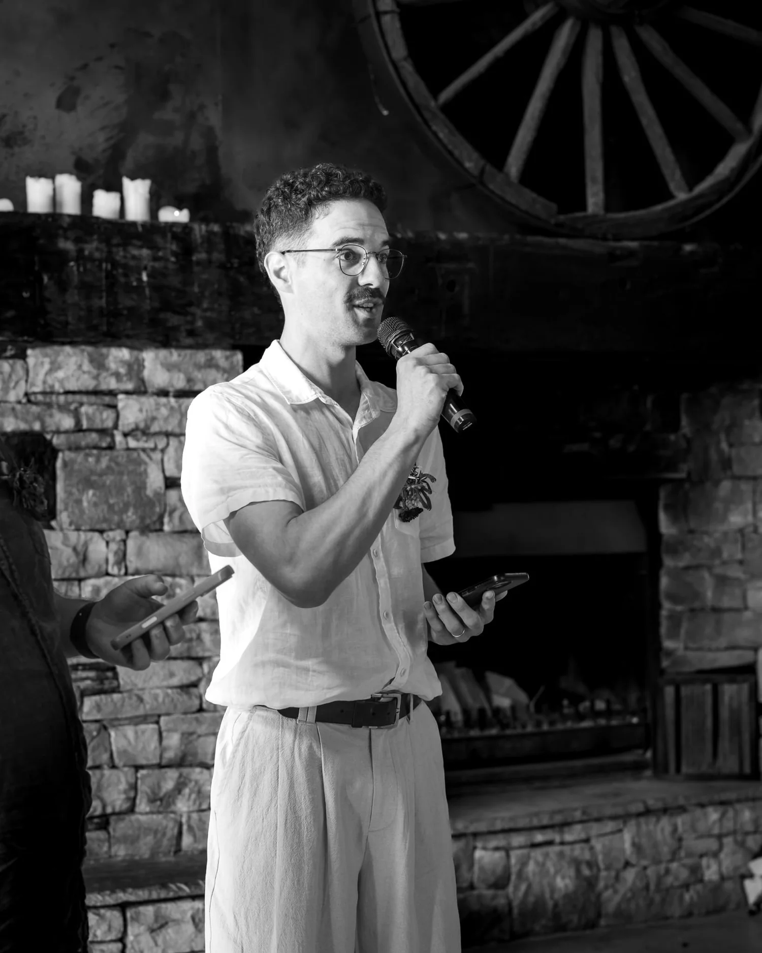 Black and white photo of a guest giving a speech