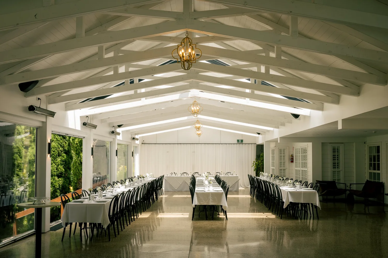 The reception hall at Bridgewater Estate set with long tables