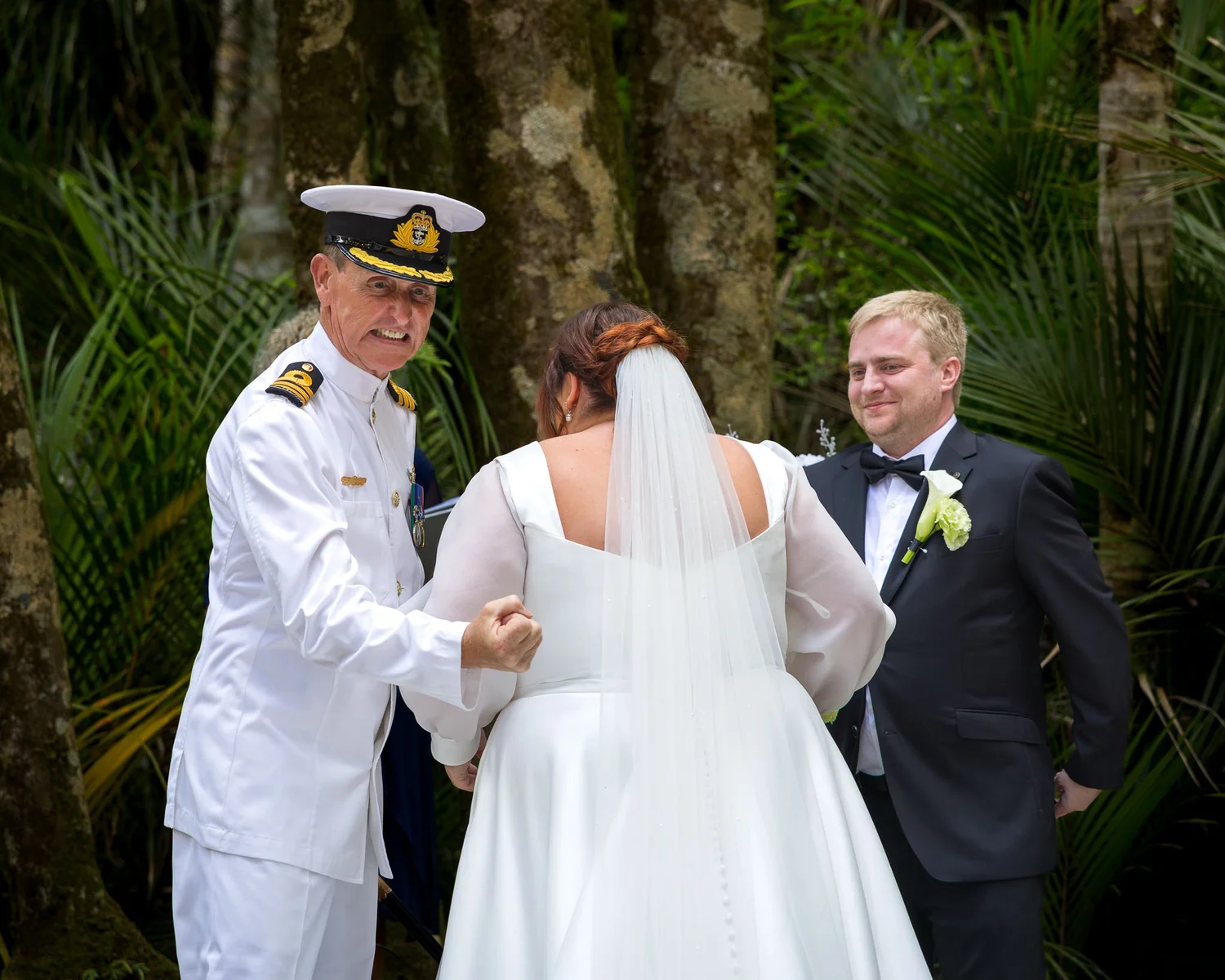 Leah is handed to Warwick at the start of the forest ceremony